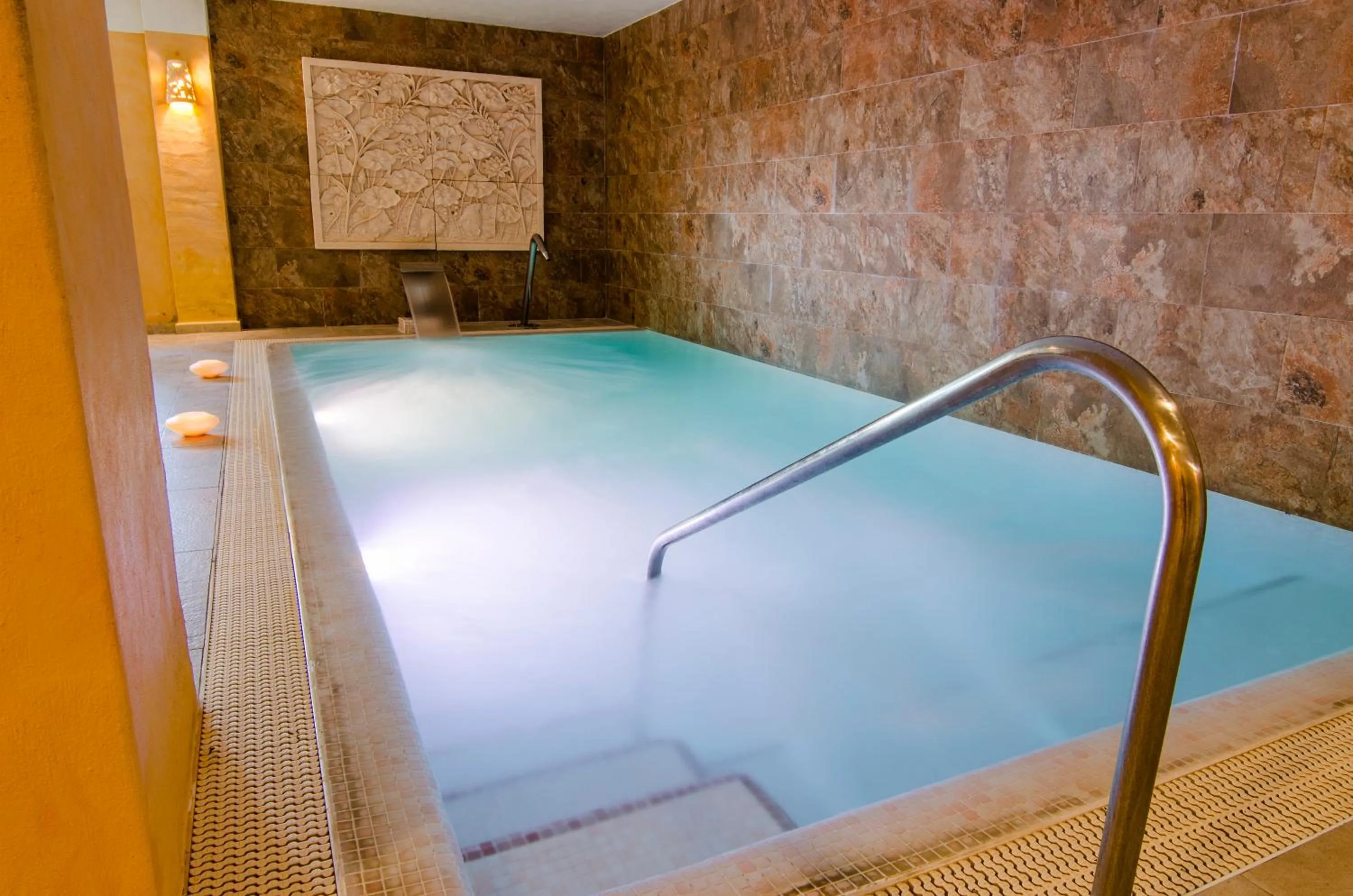 Hot Spring Bath in El Cortijo de Zahara by QHotels