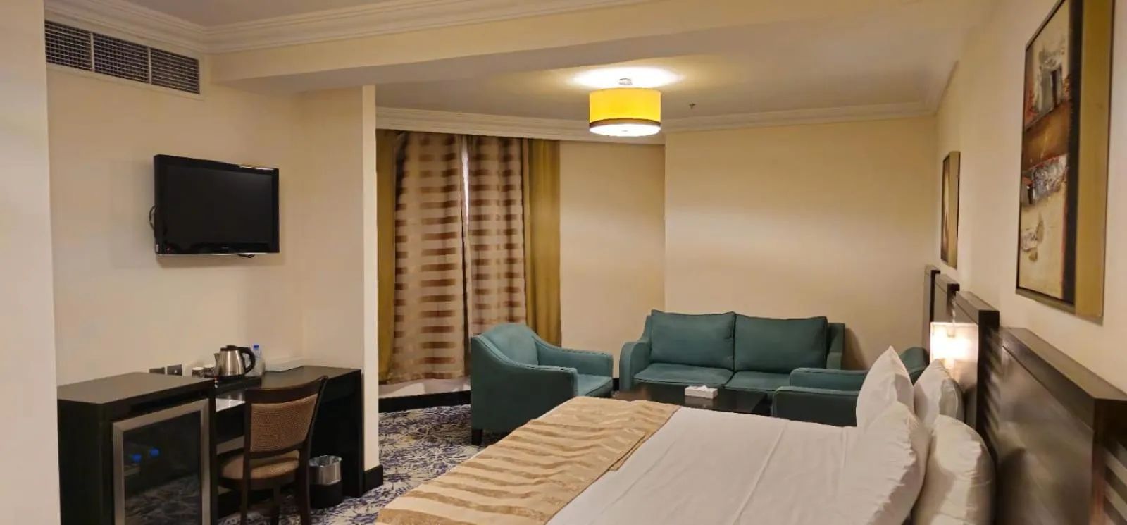 Seating area, Bed in Al Hidayah Towers Hotel