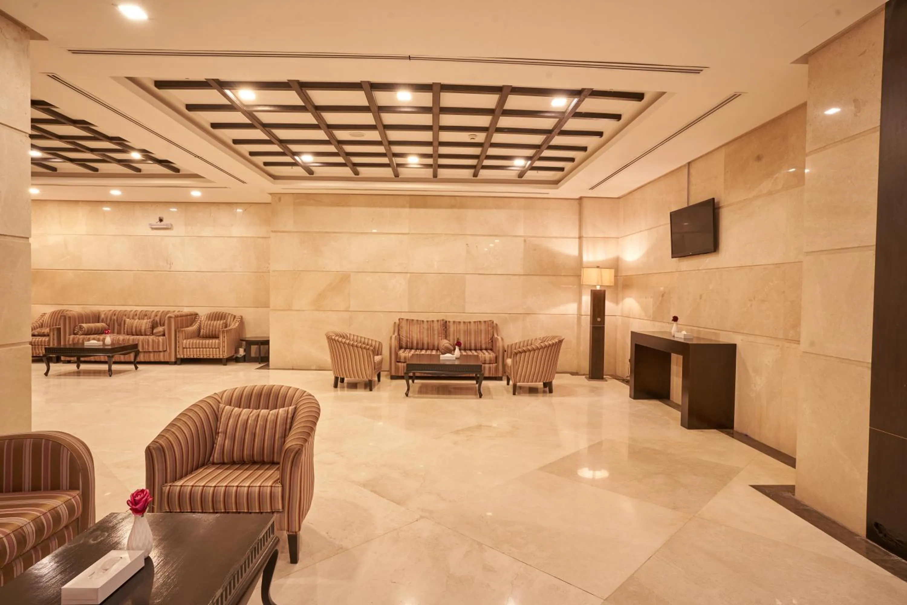 Communal lounge/ TV room in Al Hidayah Towers Hotel