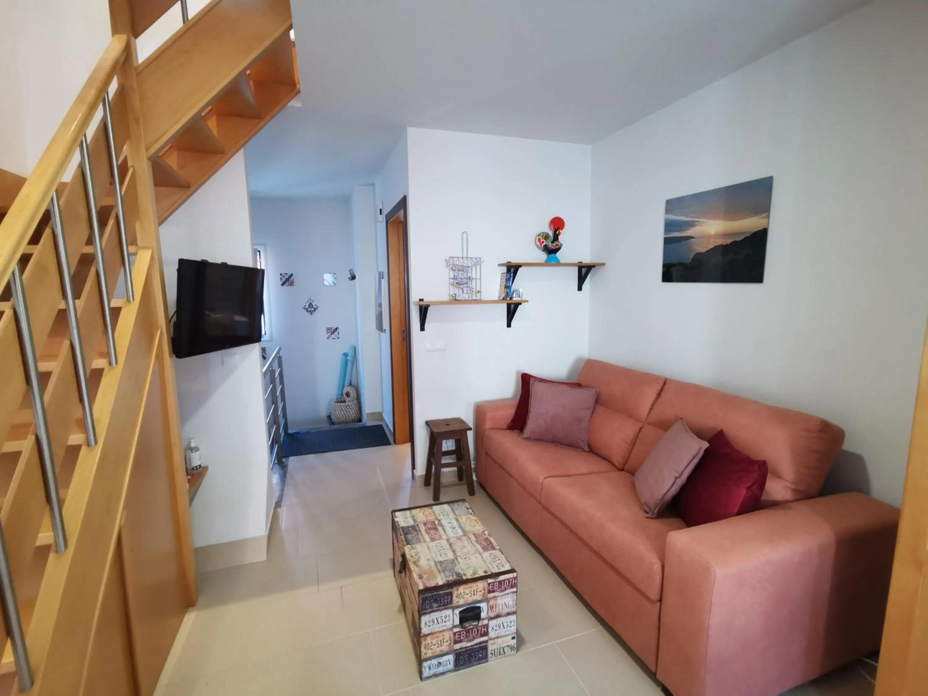 Communal lounge/ TV room in Casa na onda Liberdade-Amazing sea view