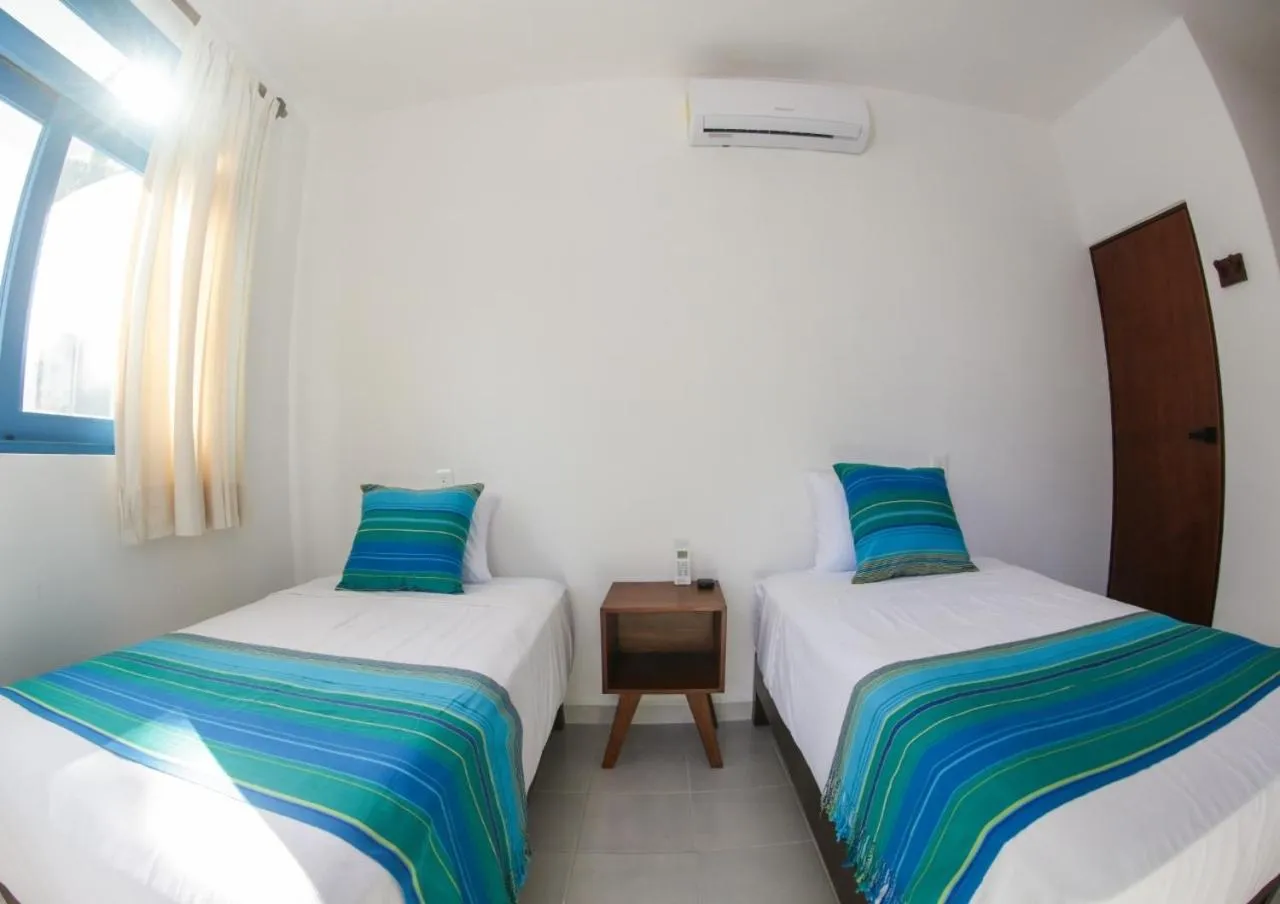 Bed in Maison Bacalar
