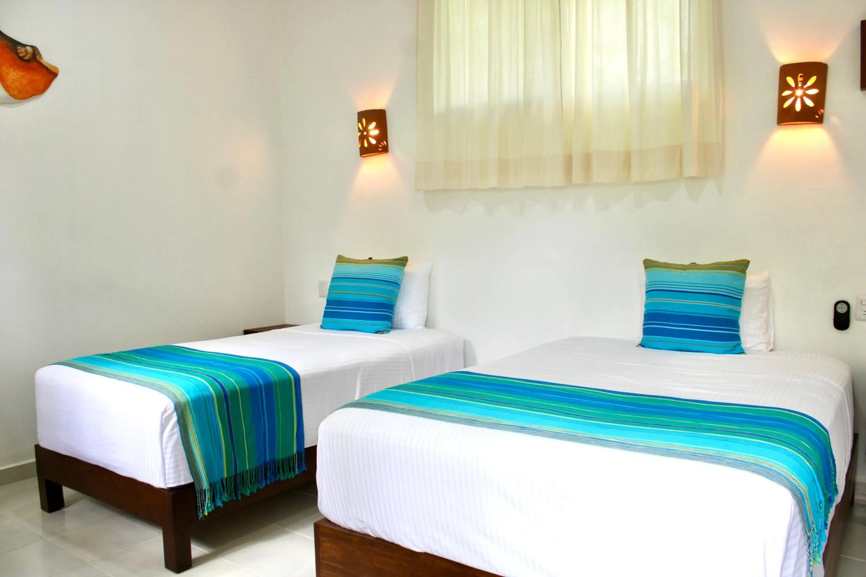 Bed in Maison Bacalar