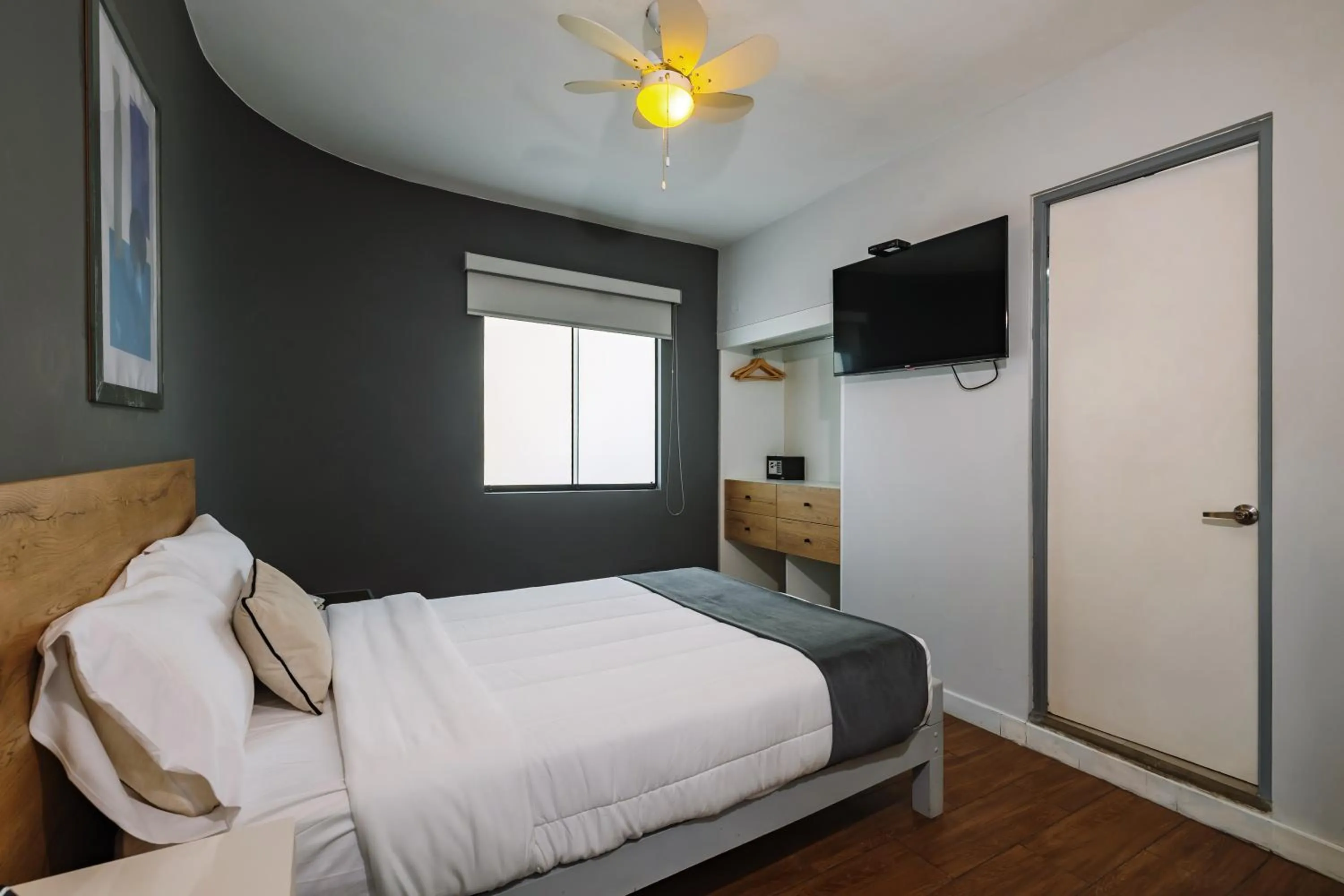 Bed in TARATA BOUTIQUE HOTEL