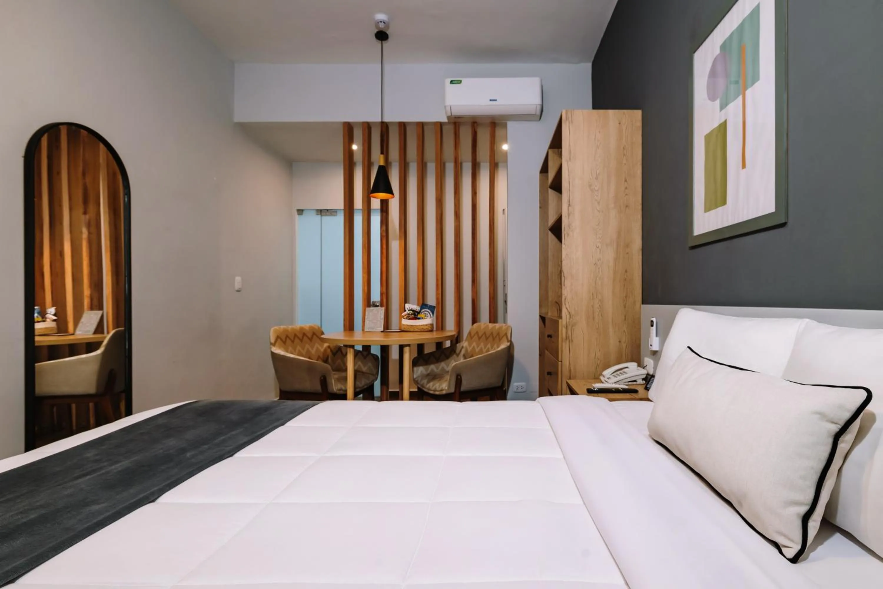 Bed in TARATA BOUTIQUE HOTEL