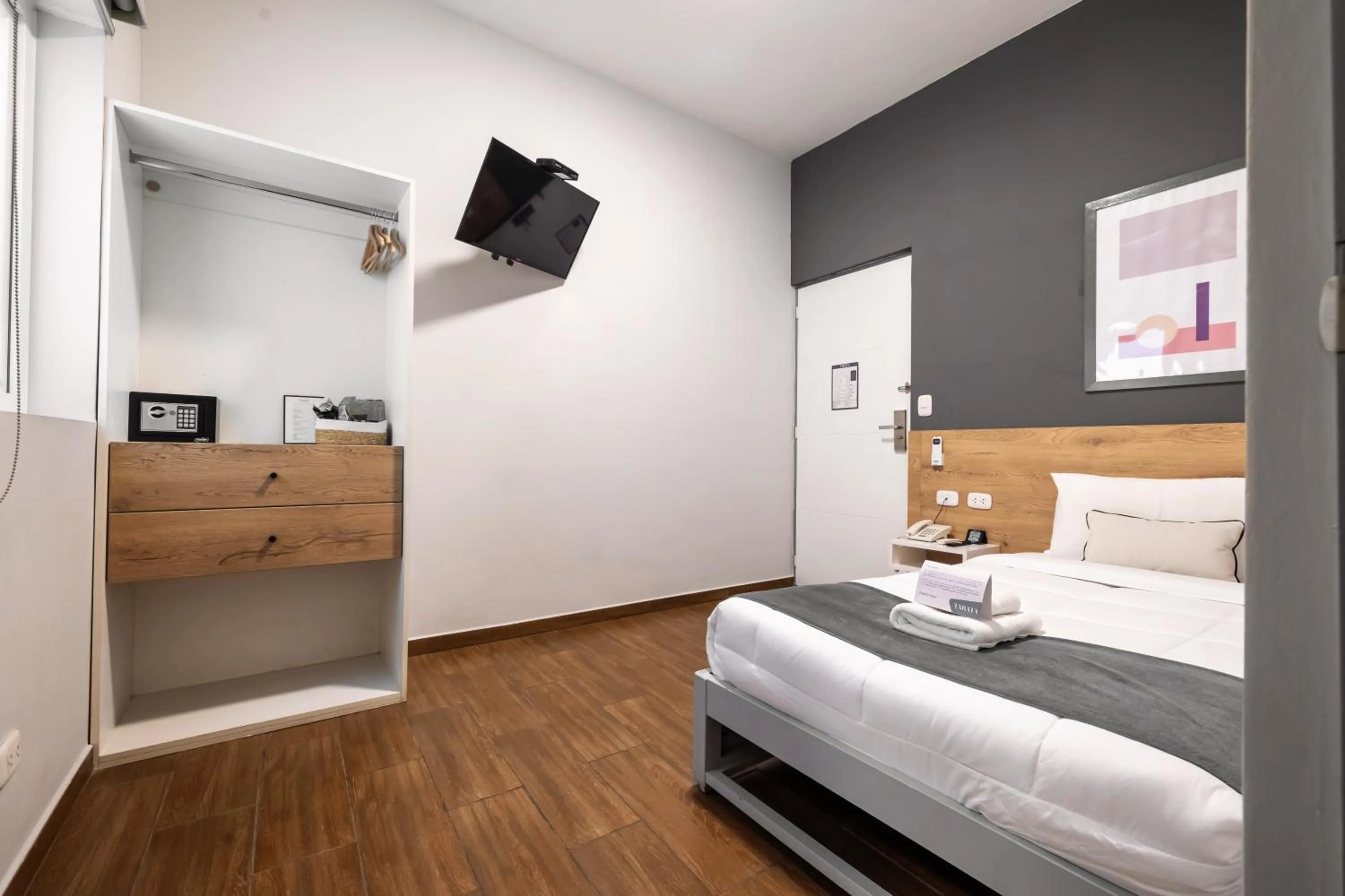 Bed in TARATA BOUTIQUE HOTEL