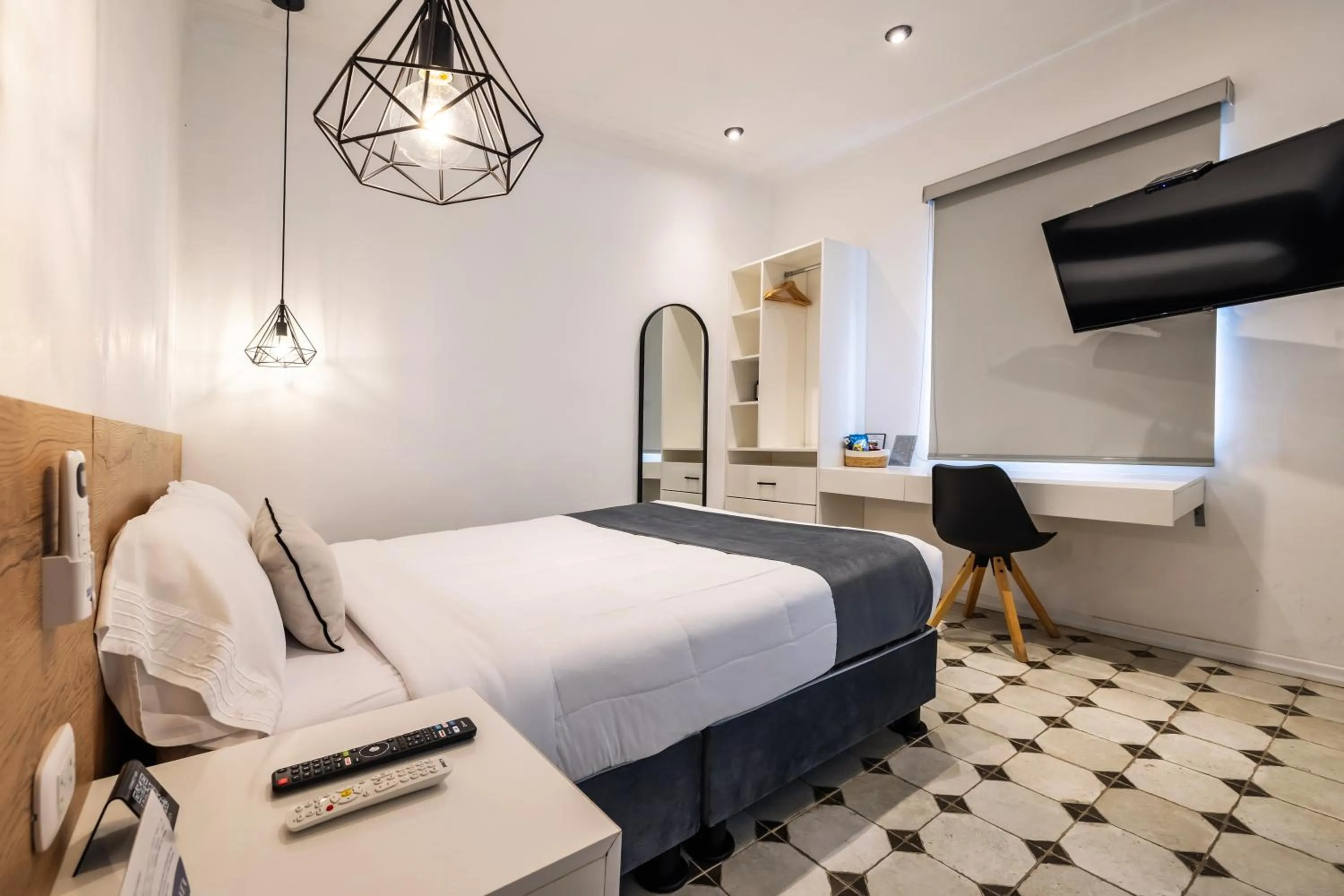 Bed in TARATA BOUTIQUE HOTEL