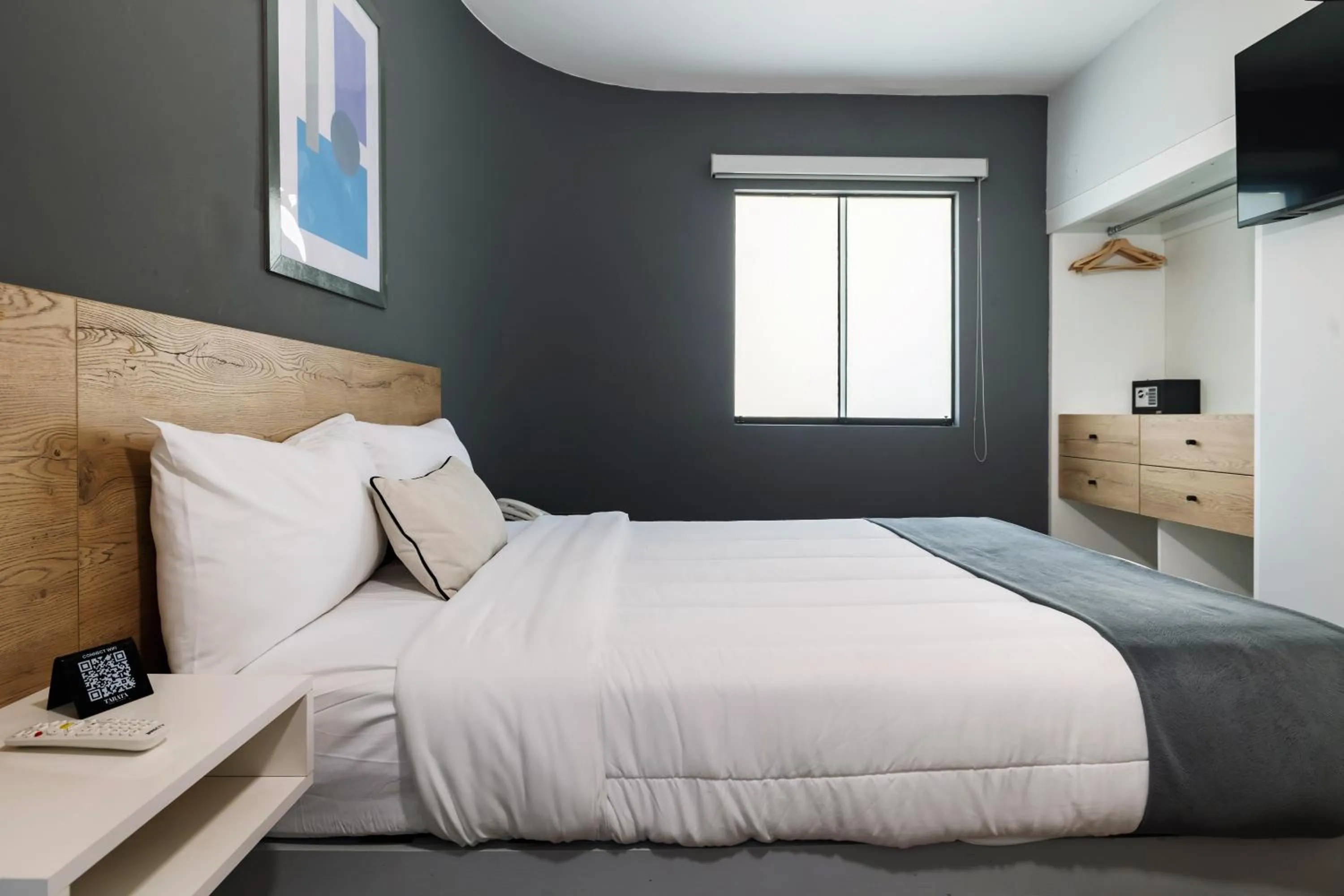 Bed in TARATA BOUTIQUE HOTEL