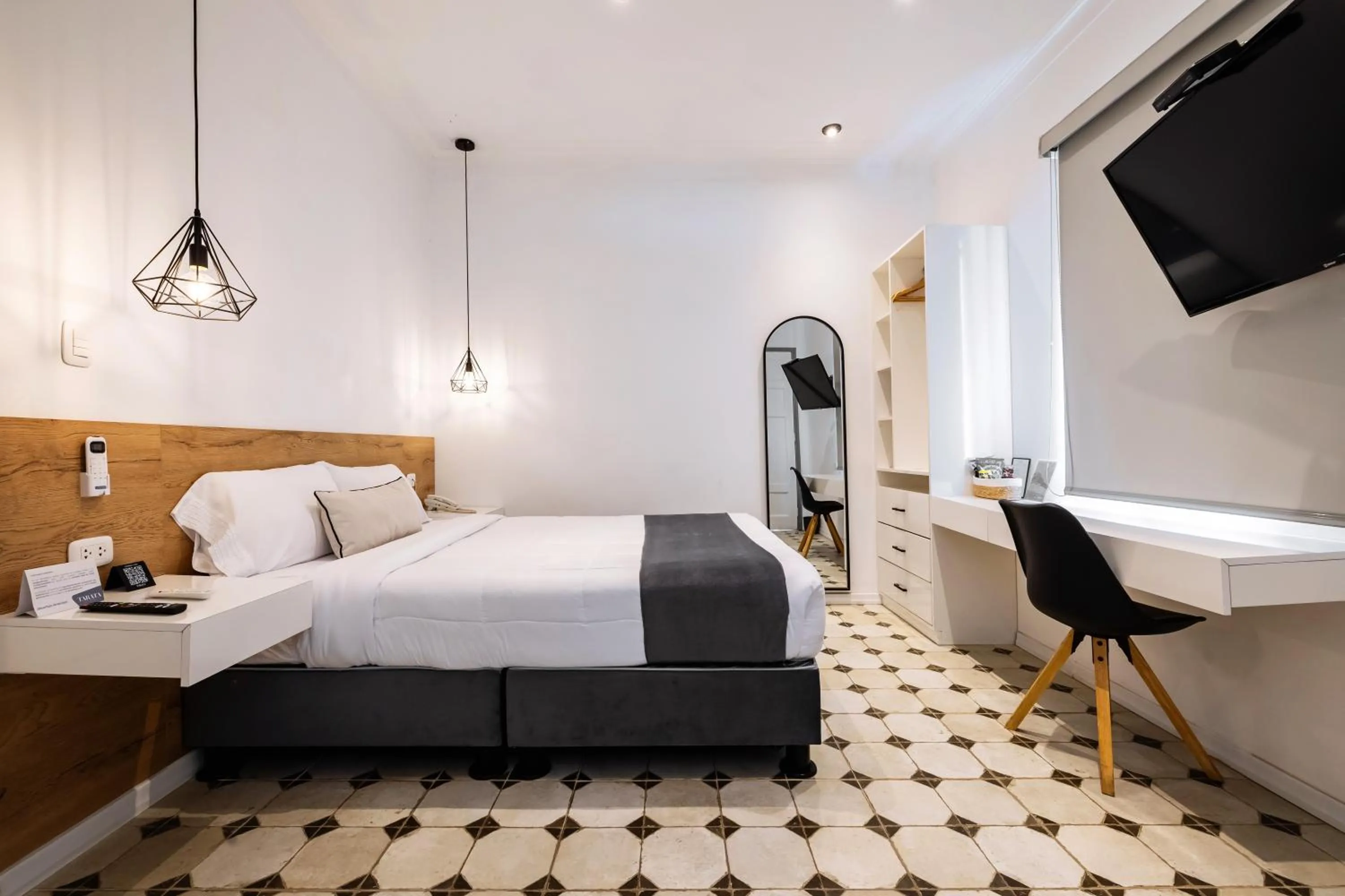 Bed in TARATA BOUTIQUE HOTEL