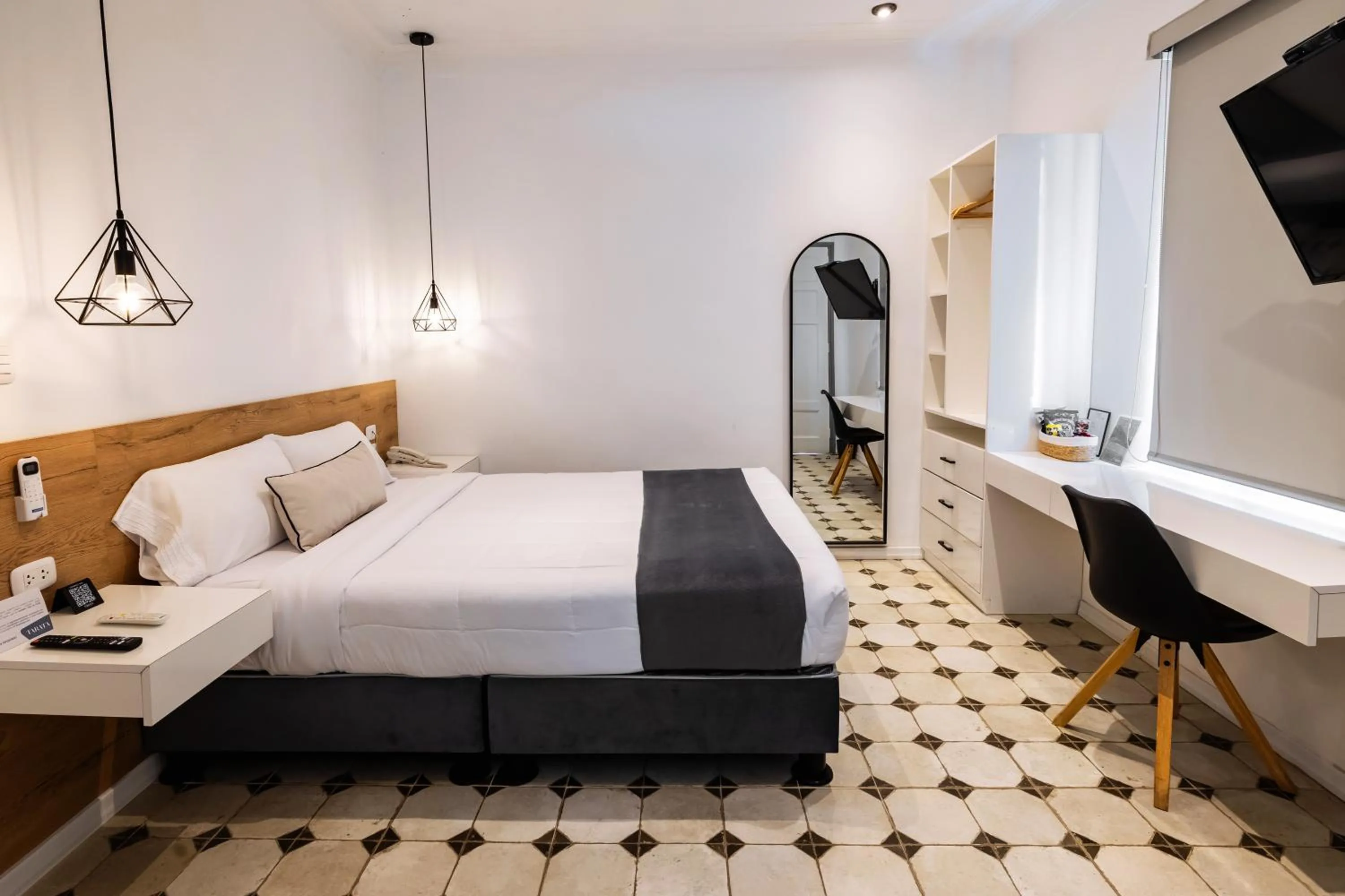 Bed in TARATA BOUTIQUE HOTEL