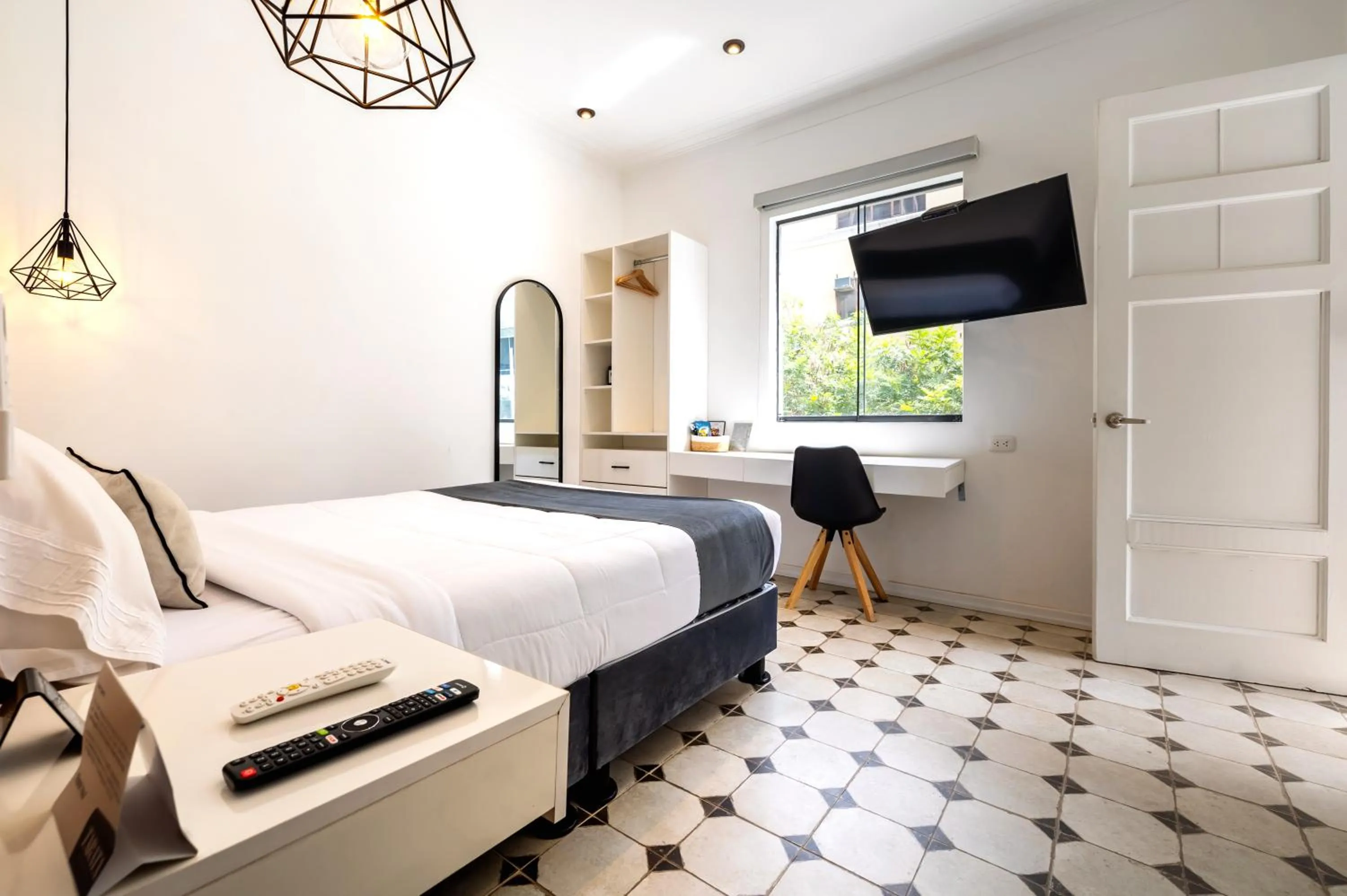 Bed in TARATA BOUTIQUE HOTEL