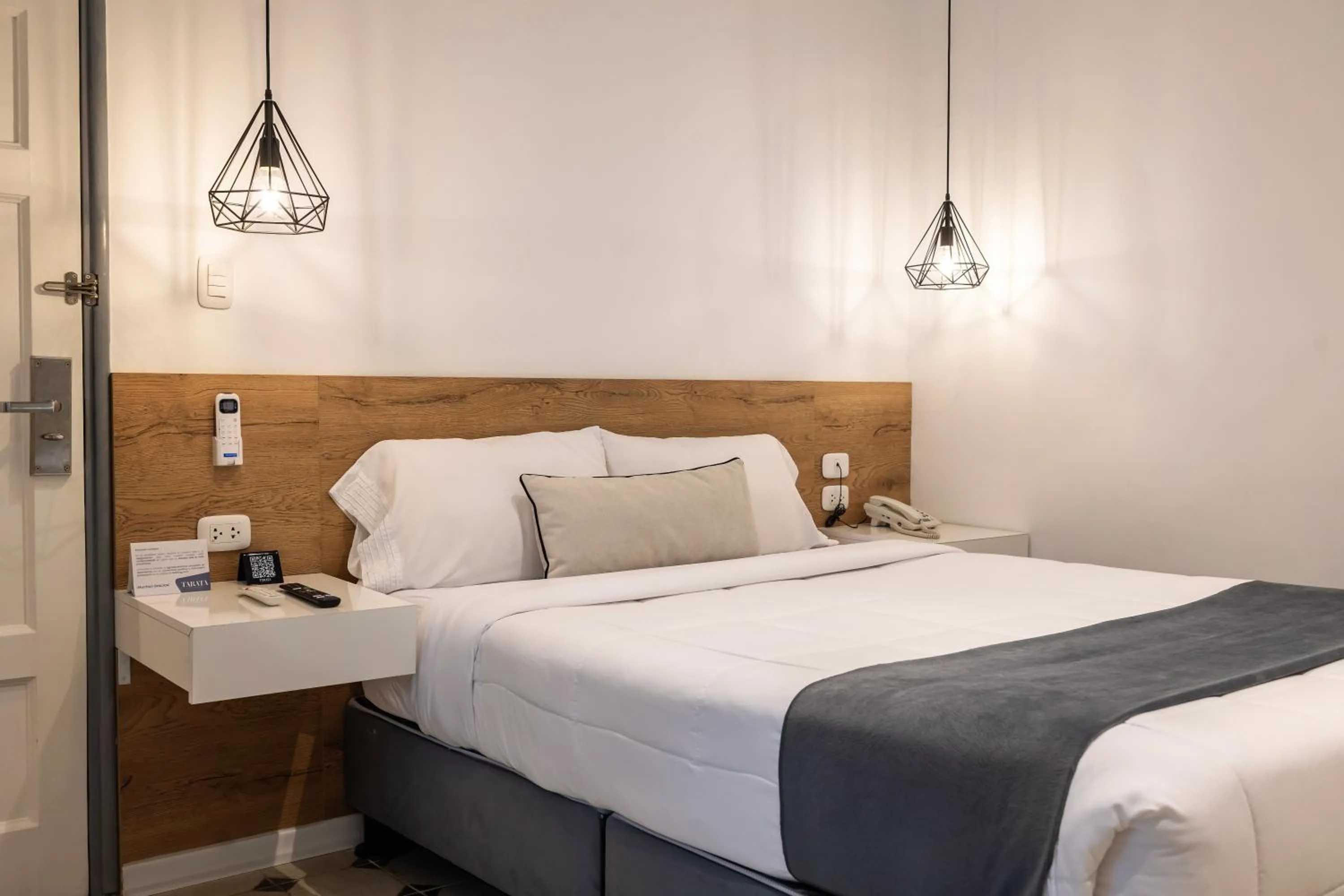 Bed in TARATA BOUTIQUE HOTEL