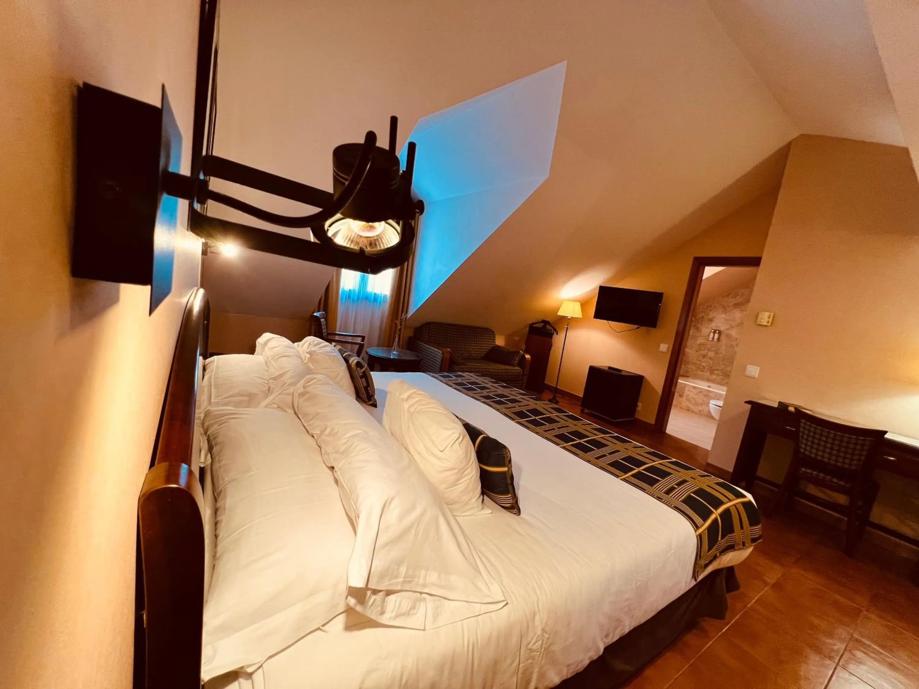 Bed in Hospedium Hotel Los Lanceros