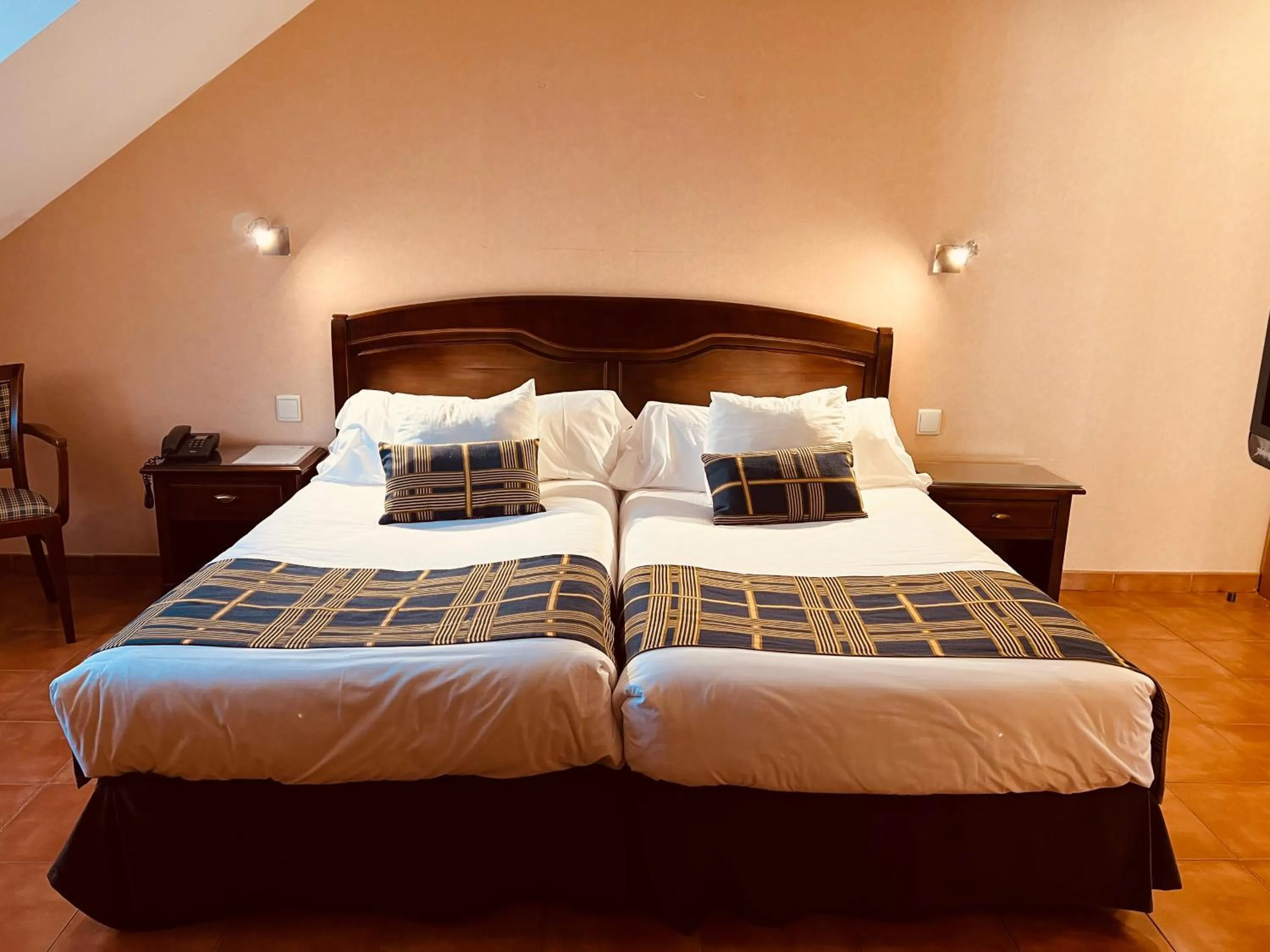 Bed in Hospedium Hotel Los Lanceros