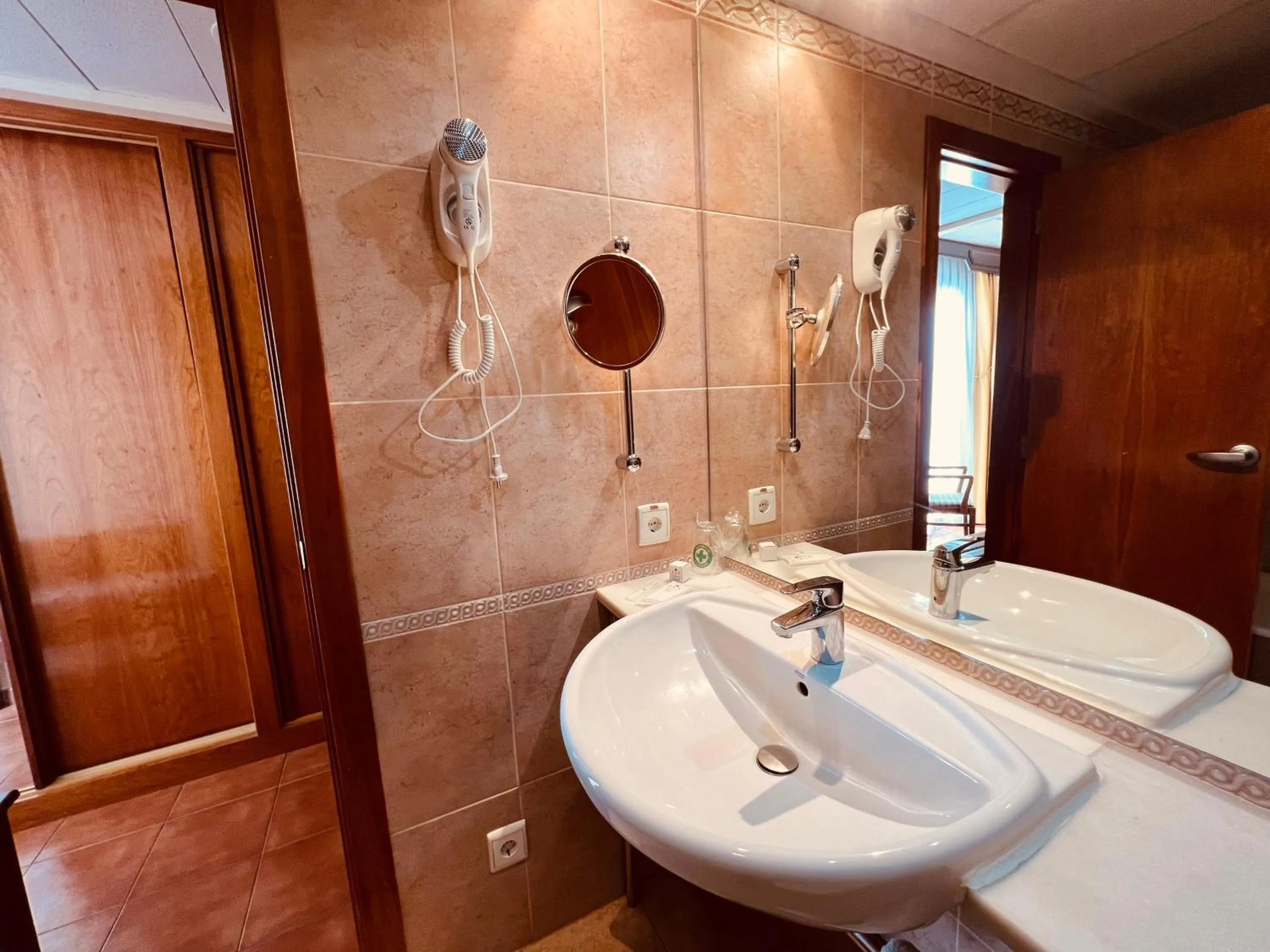 Toilet in Hospedium Hotel Los Lanceros