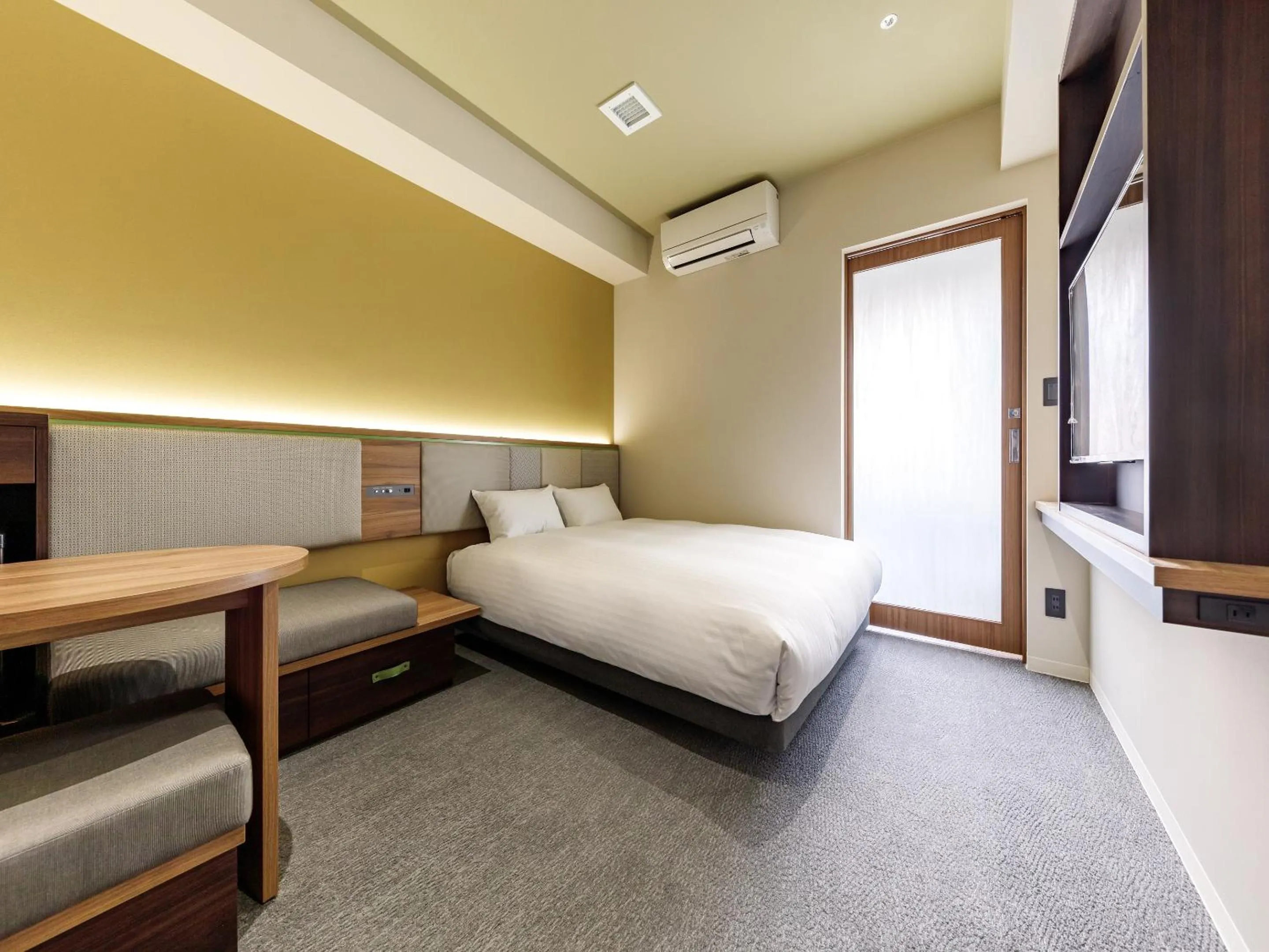 Bed in Nishitetsu Hotel Croom Hakata Gion Kushida Shrine