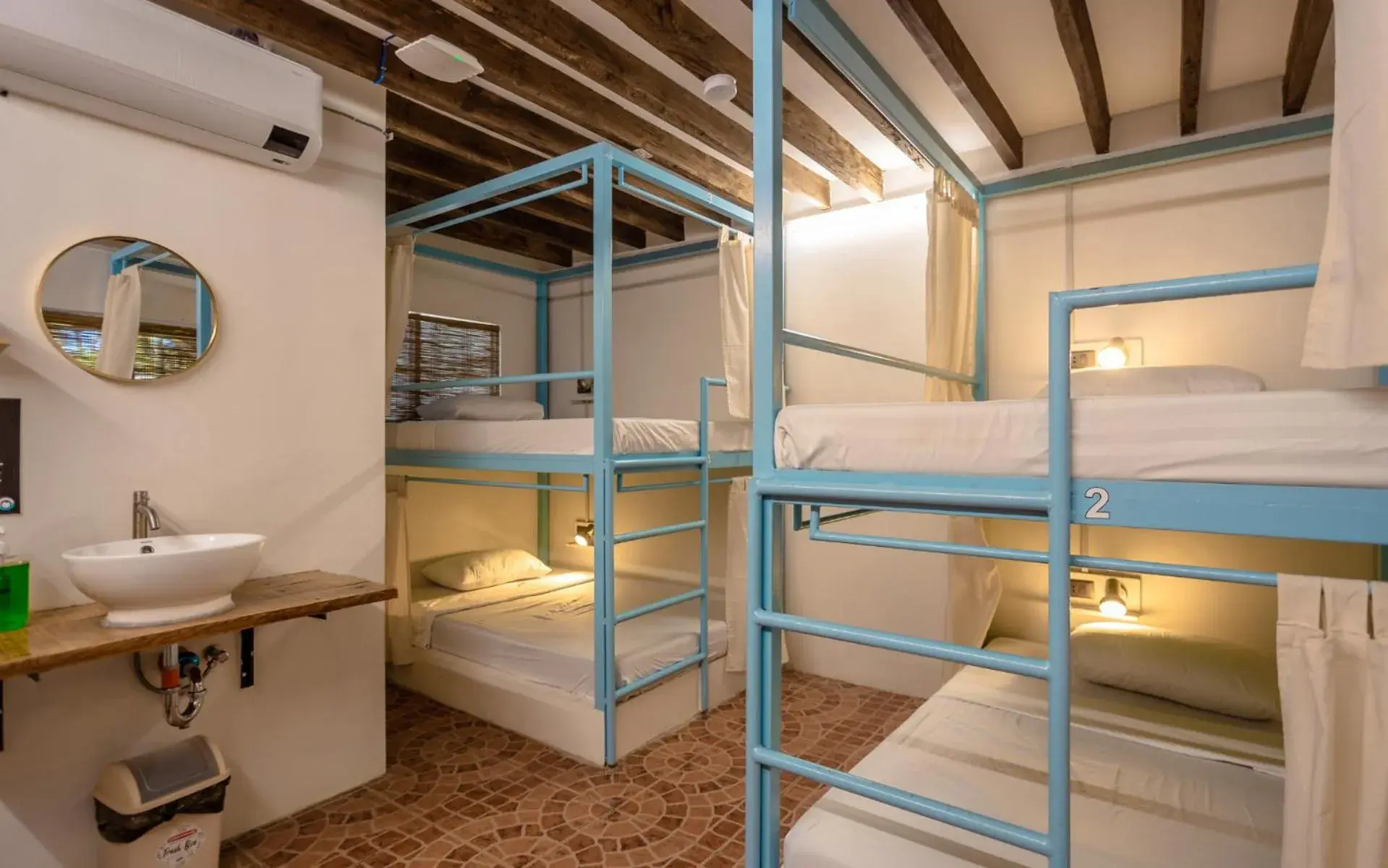 Bed in 4-Bed Female Dormitory Room in Mad Monkey Panglao Bed in 4-Bed Female Dormitory Room in Mad Monkey Panglao