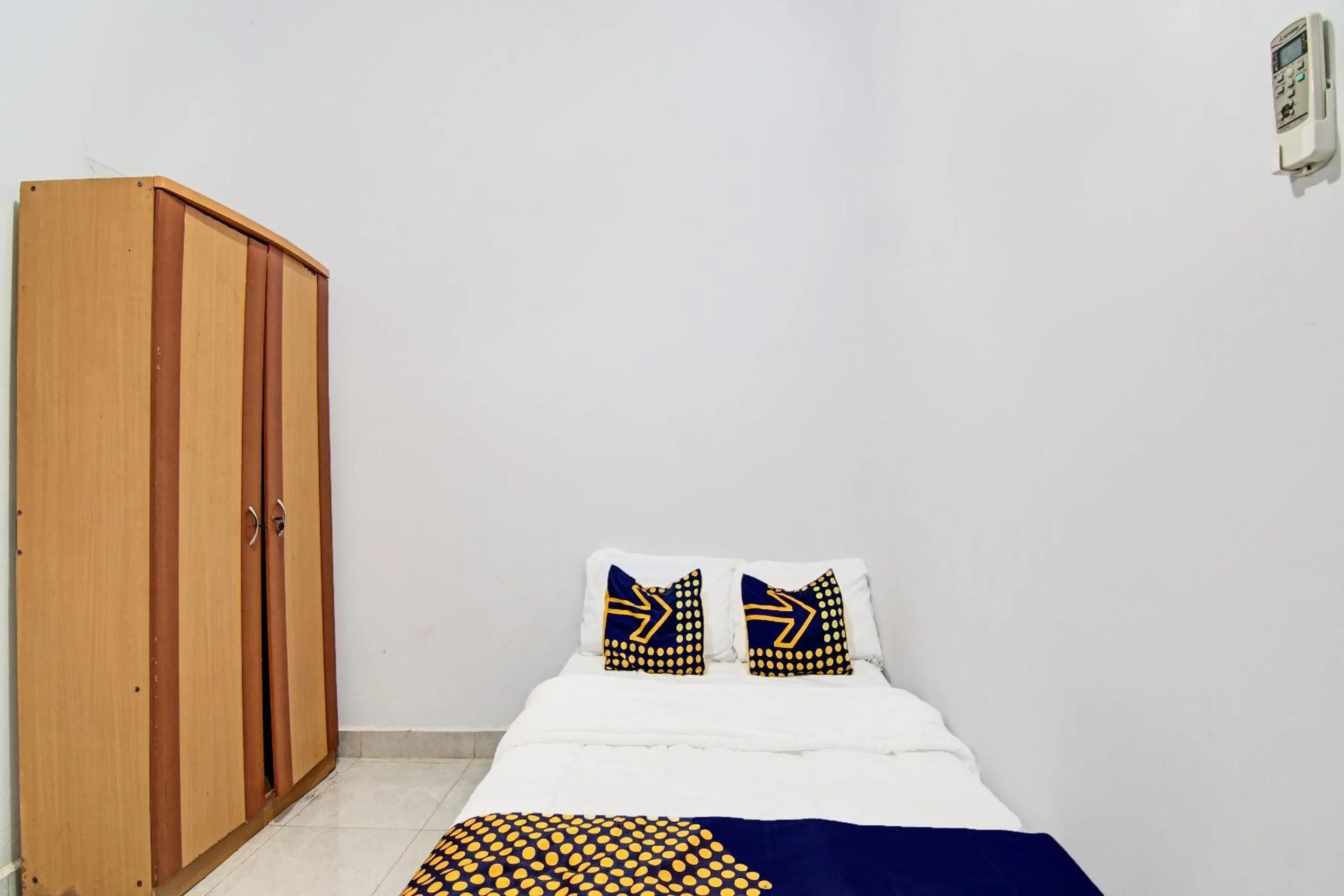Bedroom in SPOT ON 91950 Guest House TekNong Syariah