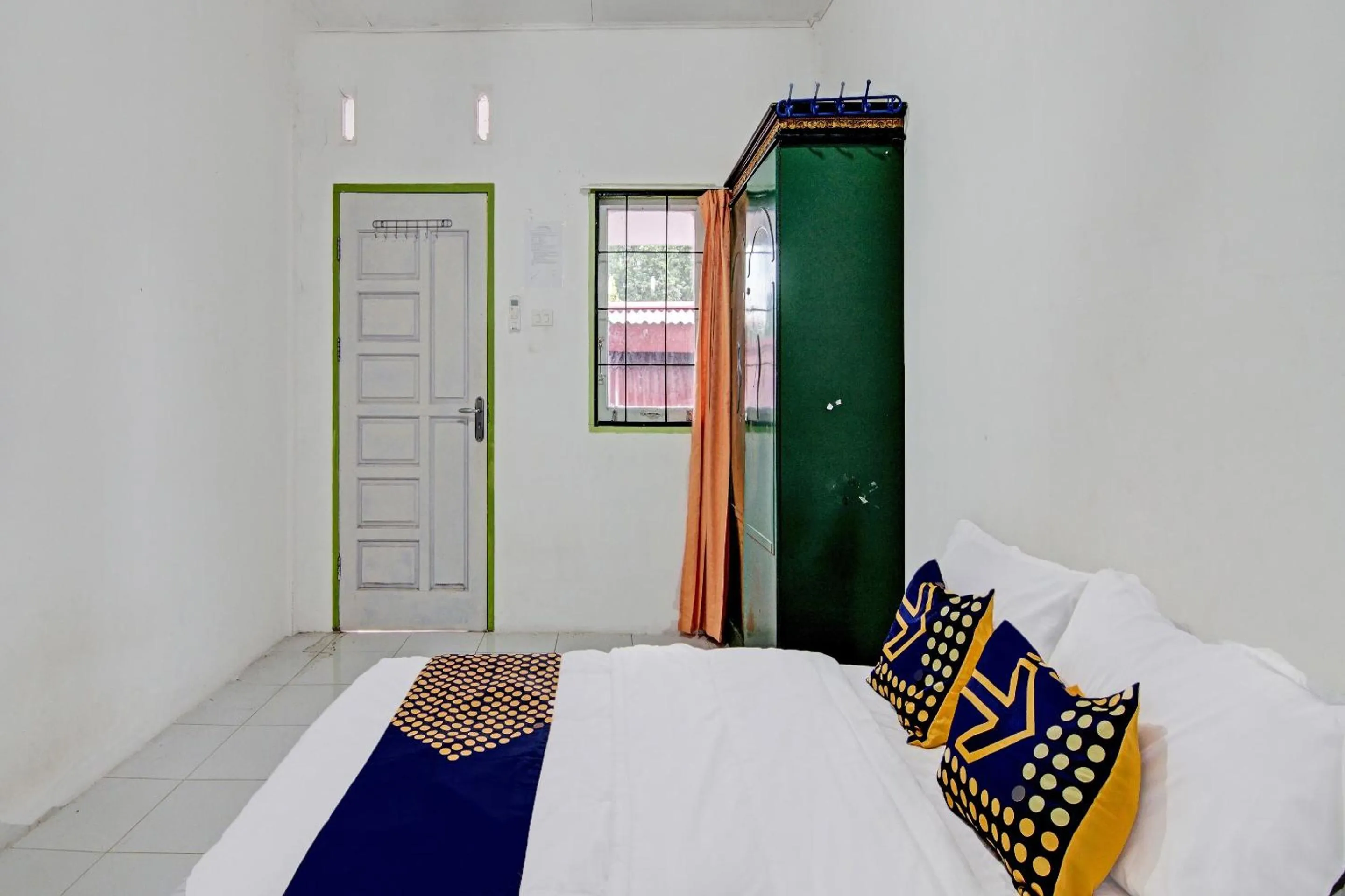 Bedroom in SPOT ON 91950 Guest House TekNong Syariah