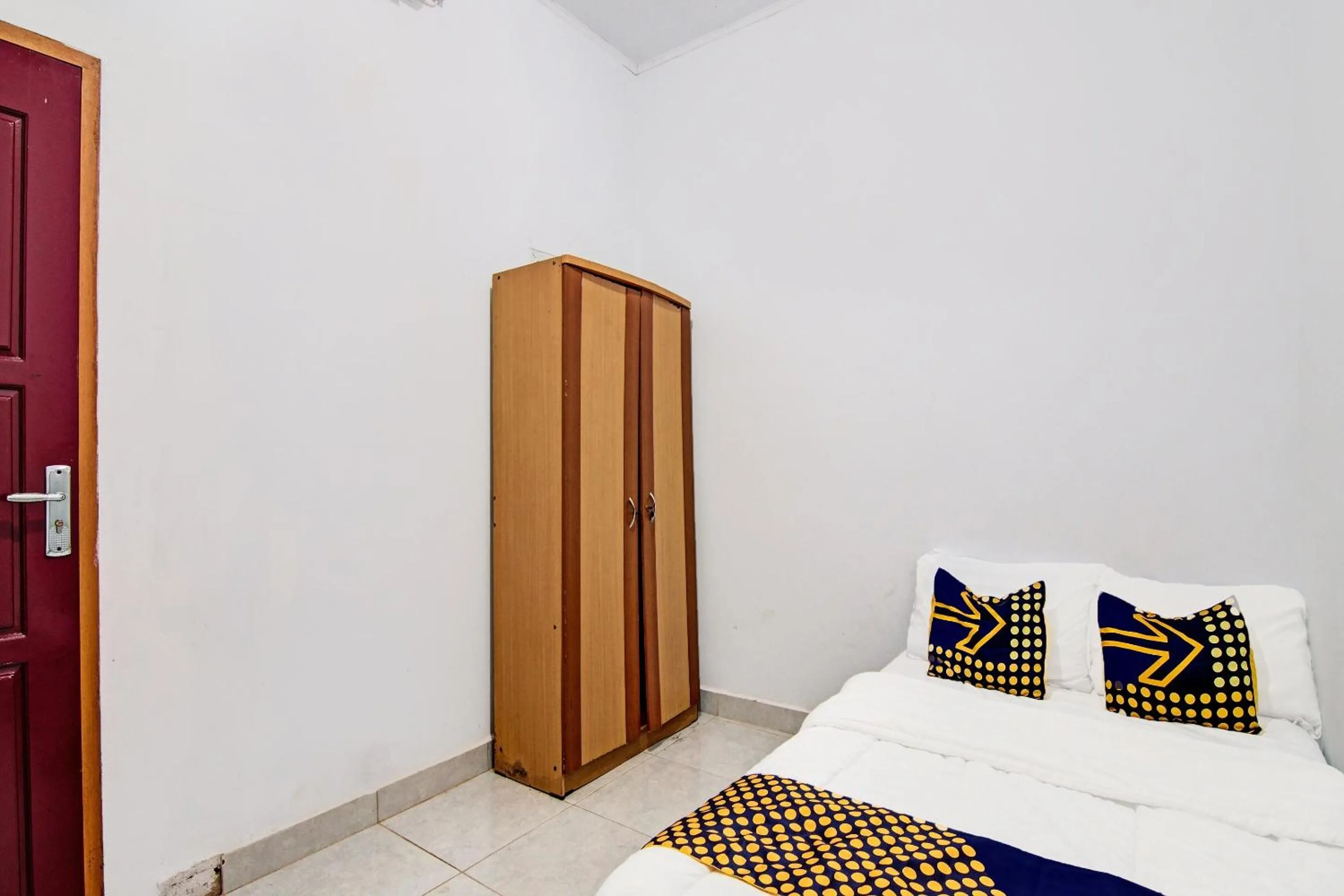 Bedroom in SPOT ON 91950 Guest House TekNong Syariah