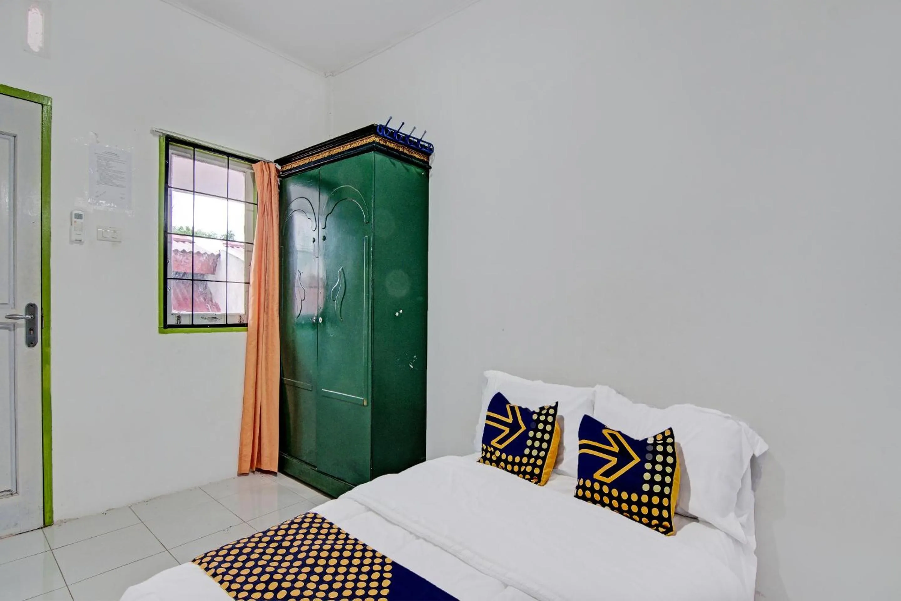 Bedroom in SPOT ON 91950 Guest House TekNong Syariah