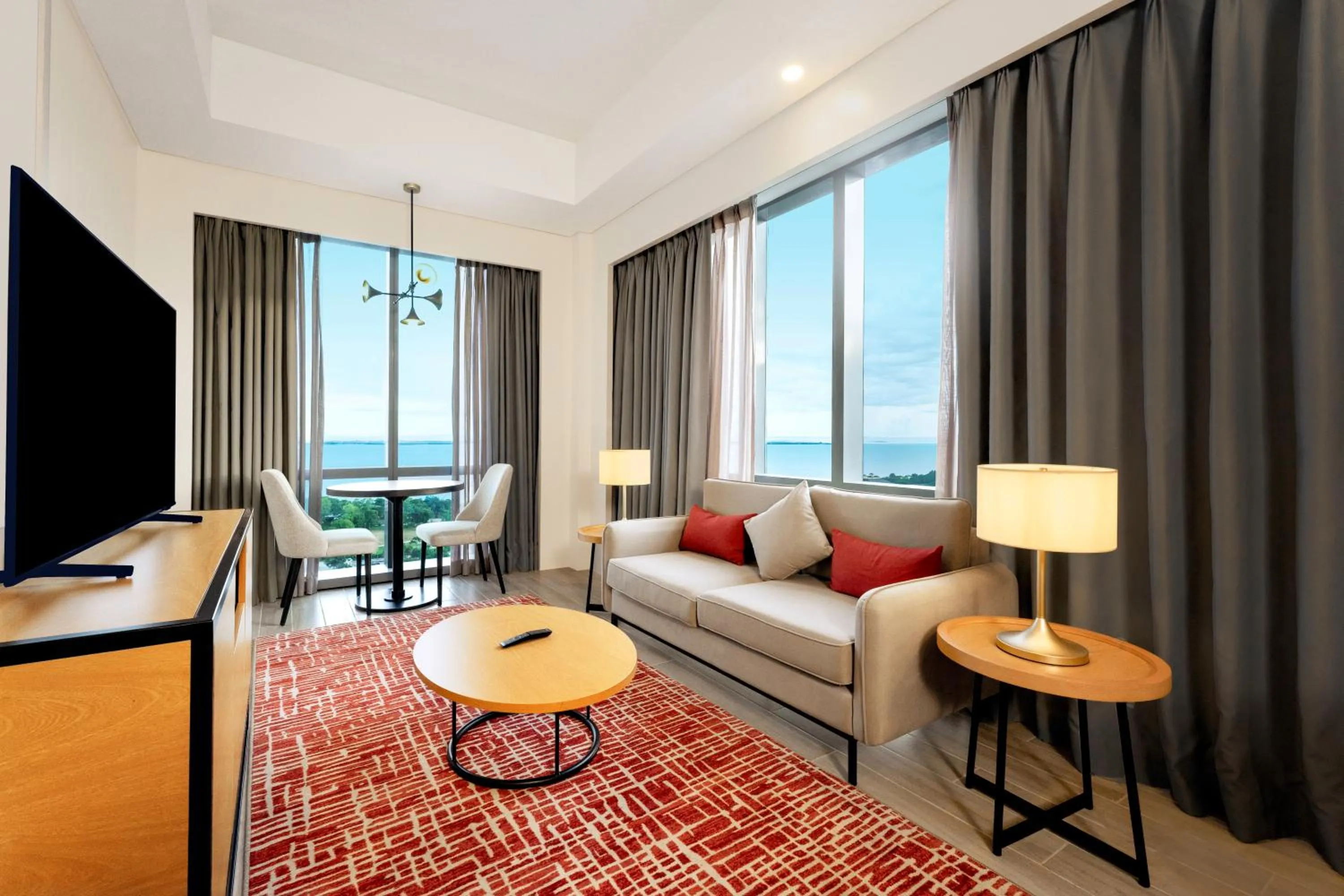 Living room, Bed in Mercure Mactan Cebu