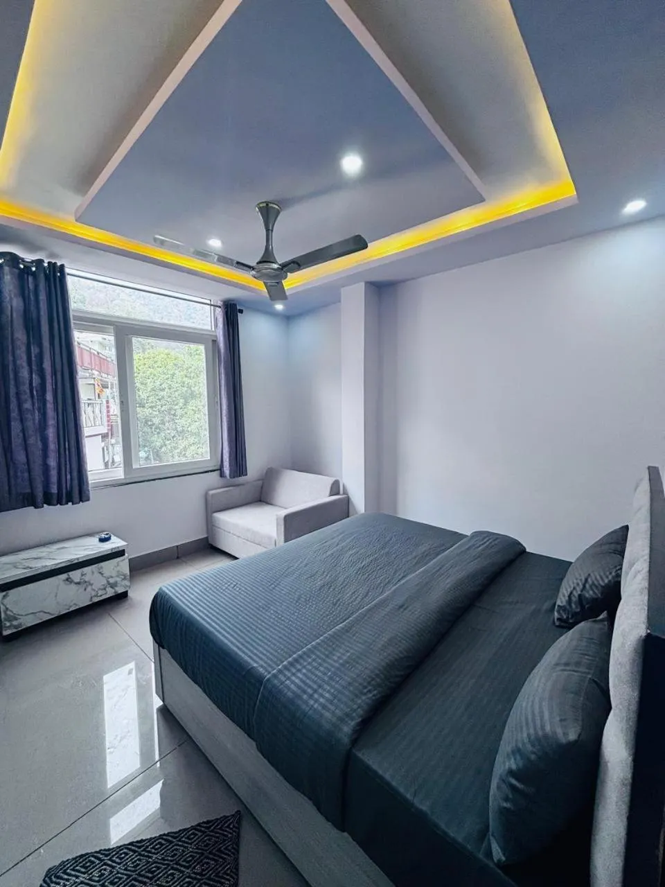 Bed in Hotel Paradise Palm