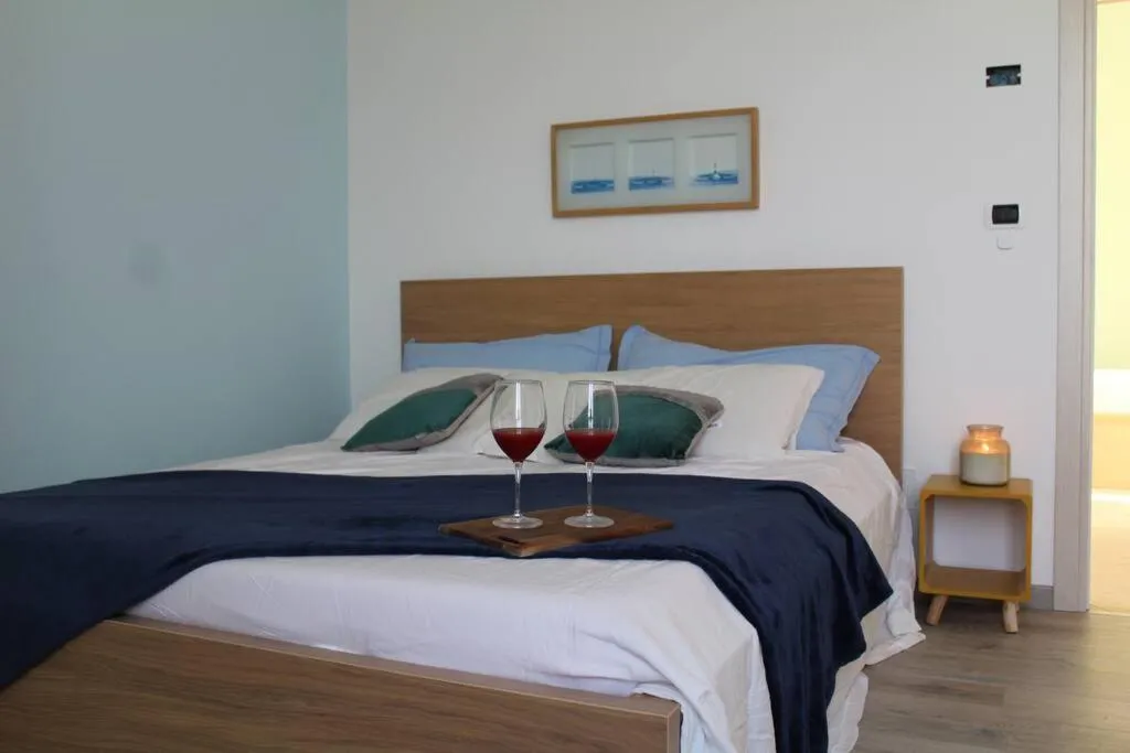 Bed in Appartamento romantico con piscina