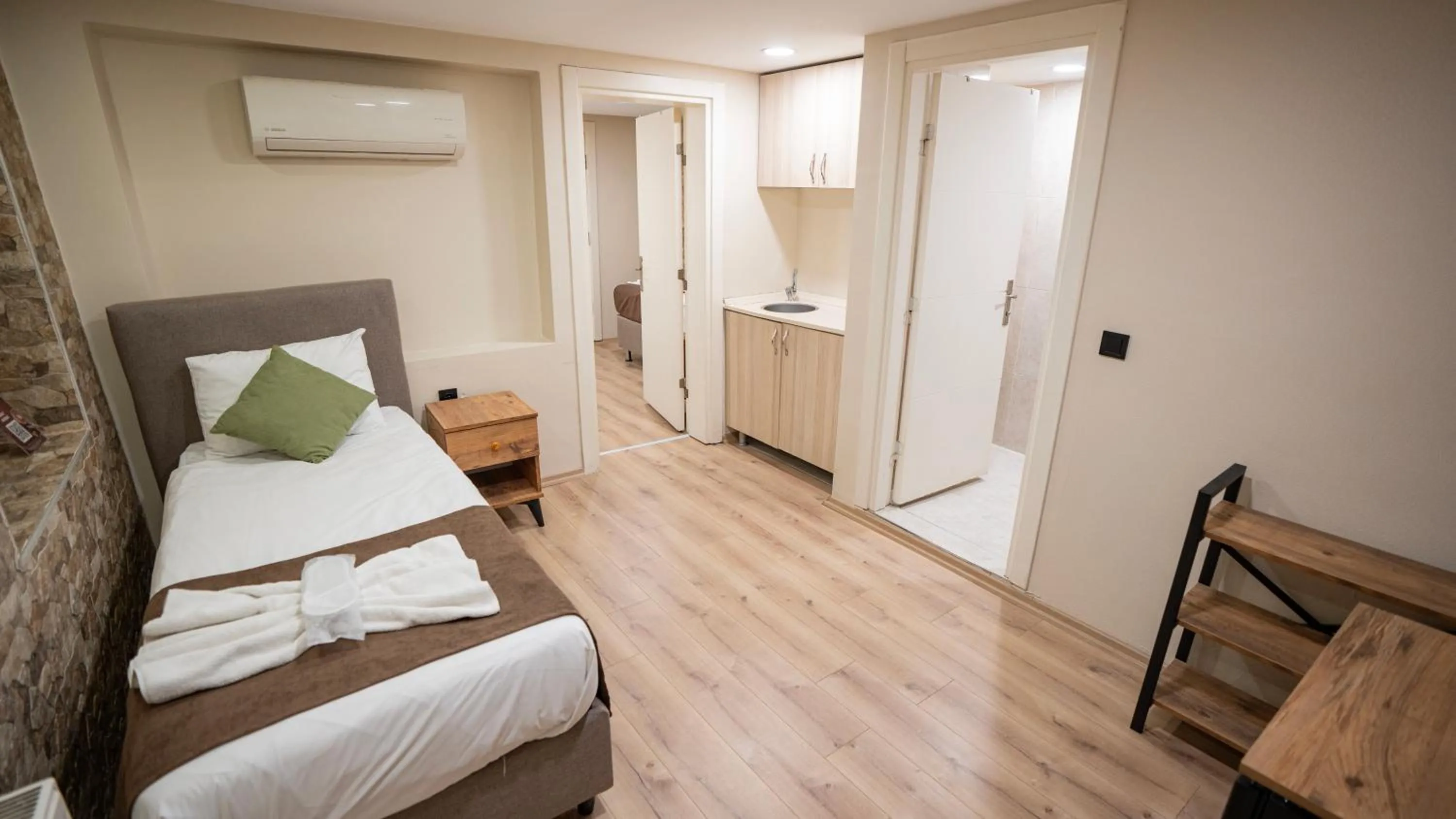 Bed in MİLA SUİTES TAKSİM