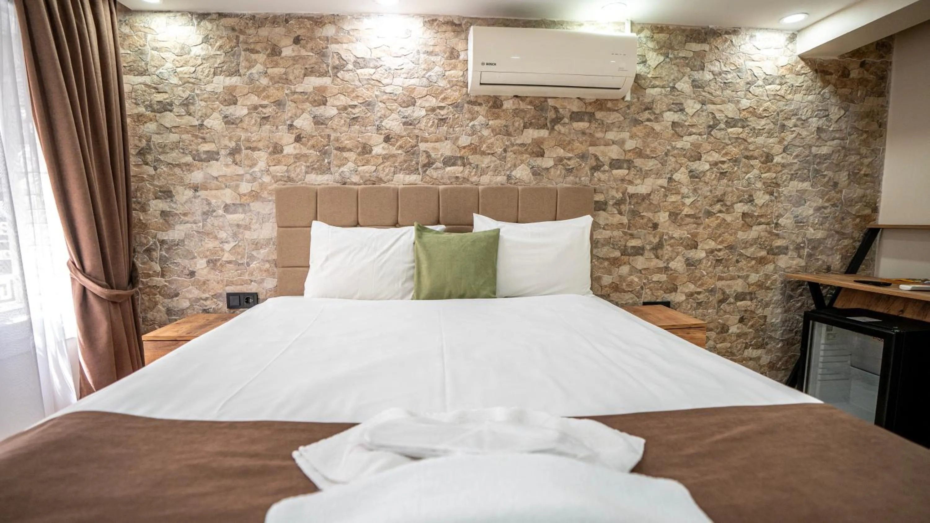 Bed in MİLA SUİTES TAKSİM