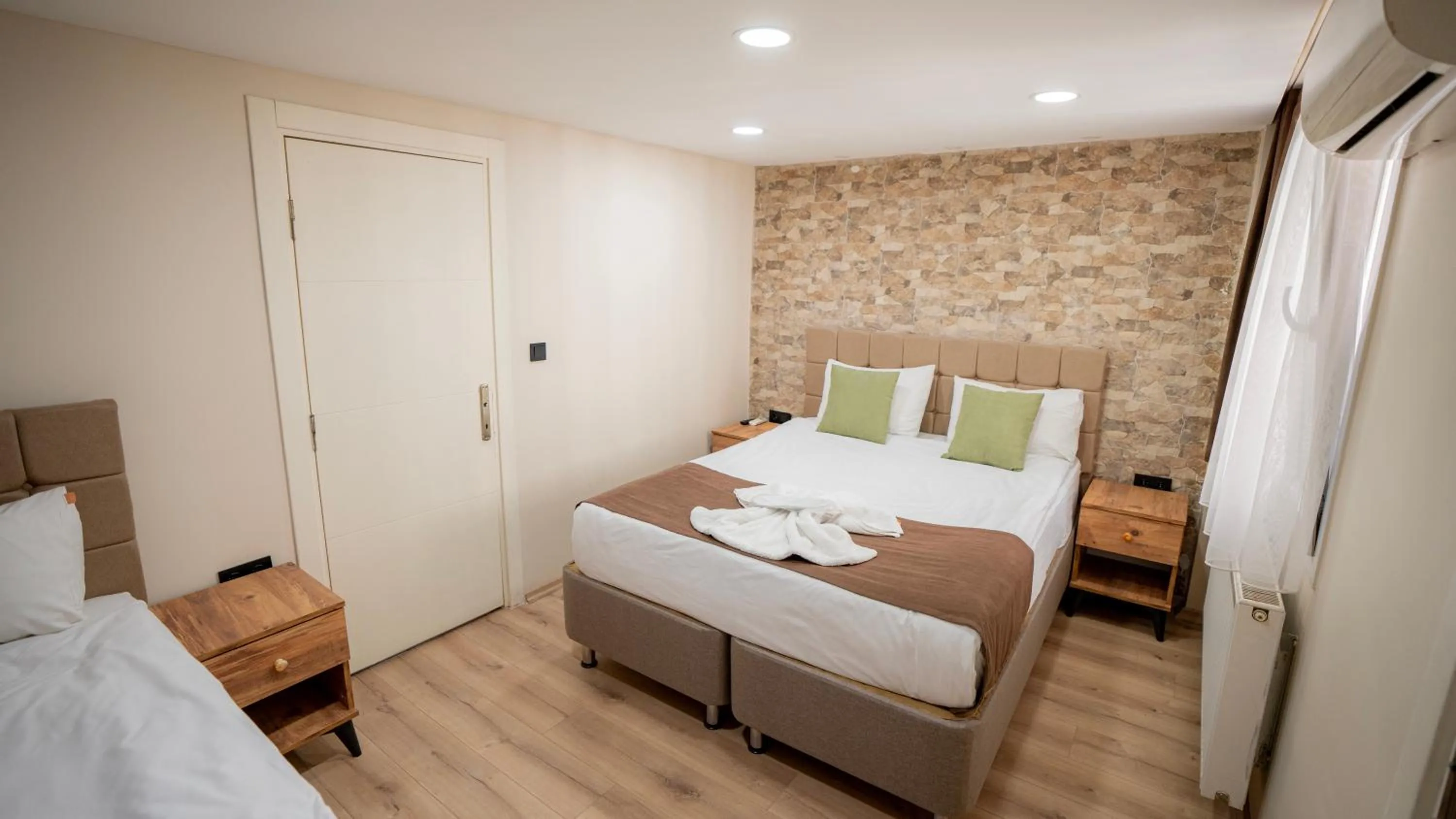 Bed in MİLA SUİTES TAKSİM