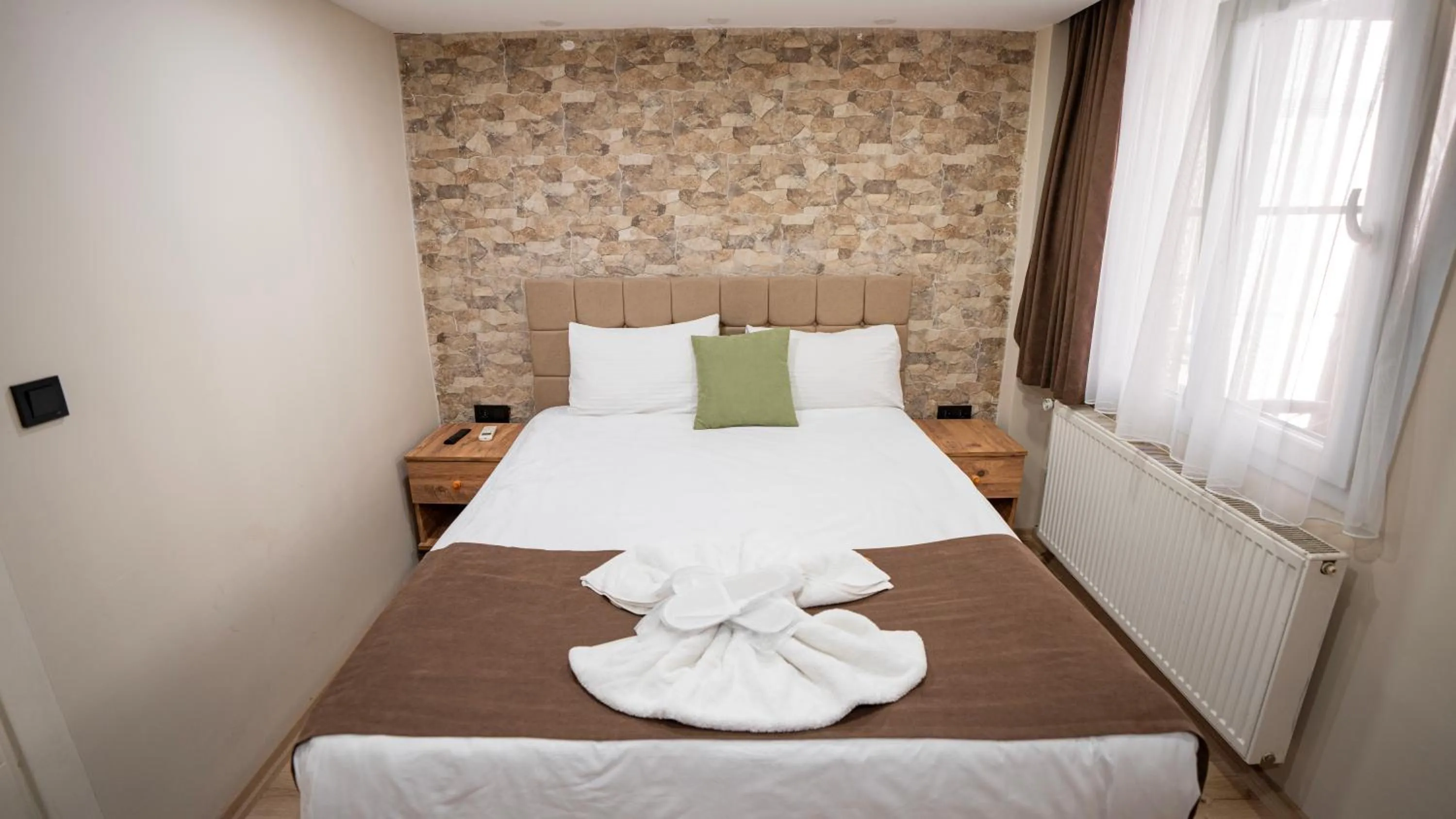 Bed in MİLA SUİTES TAKSİM