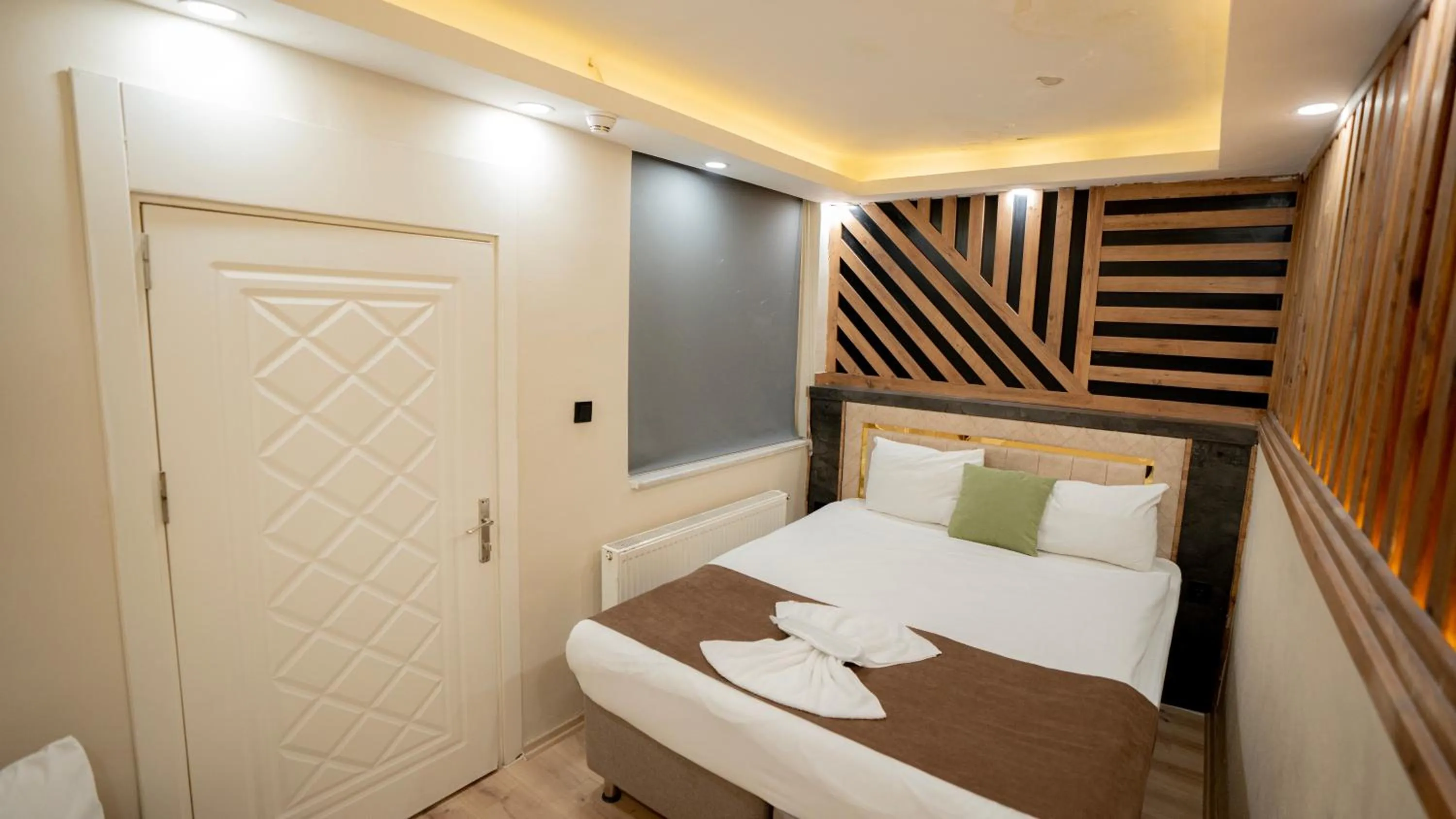 Bed in MİLA SUİTES TAKSİM