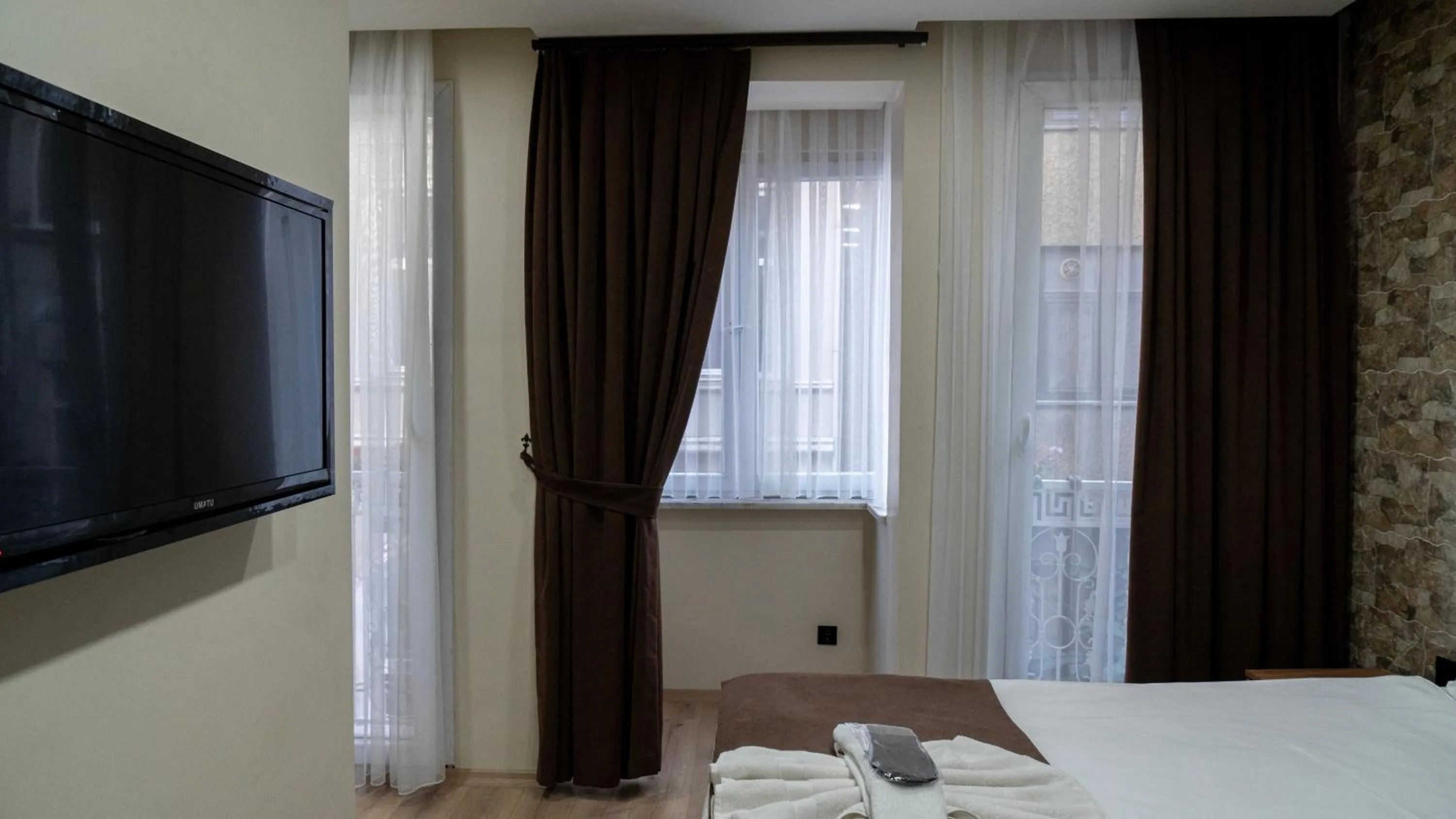 Bed in MİLA SUİTES TAKSİM