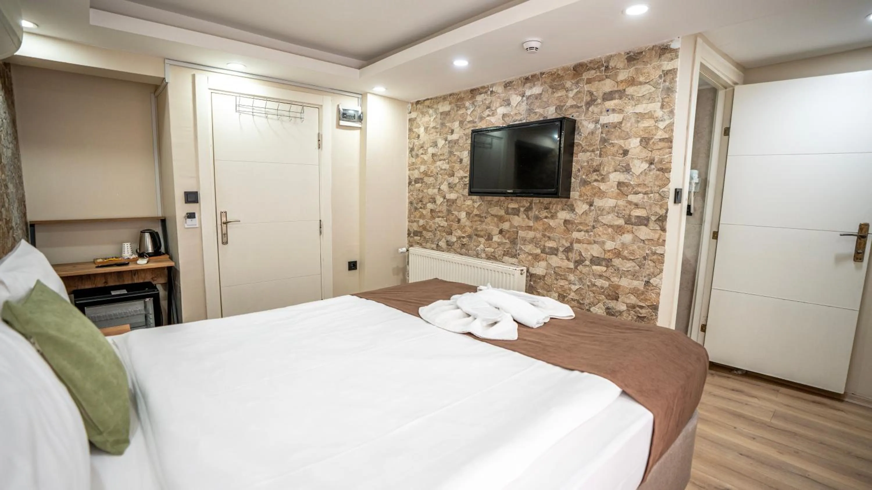 Bed in MİLA SUİTES TAKSİM