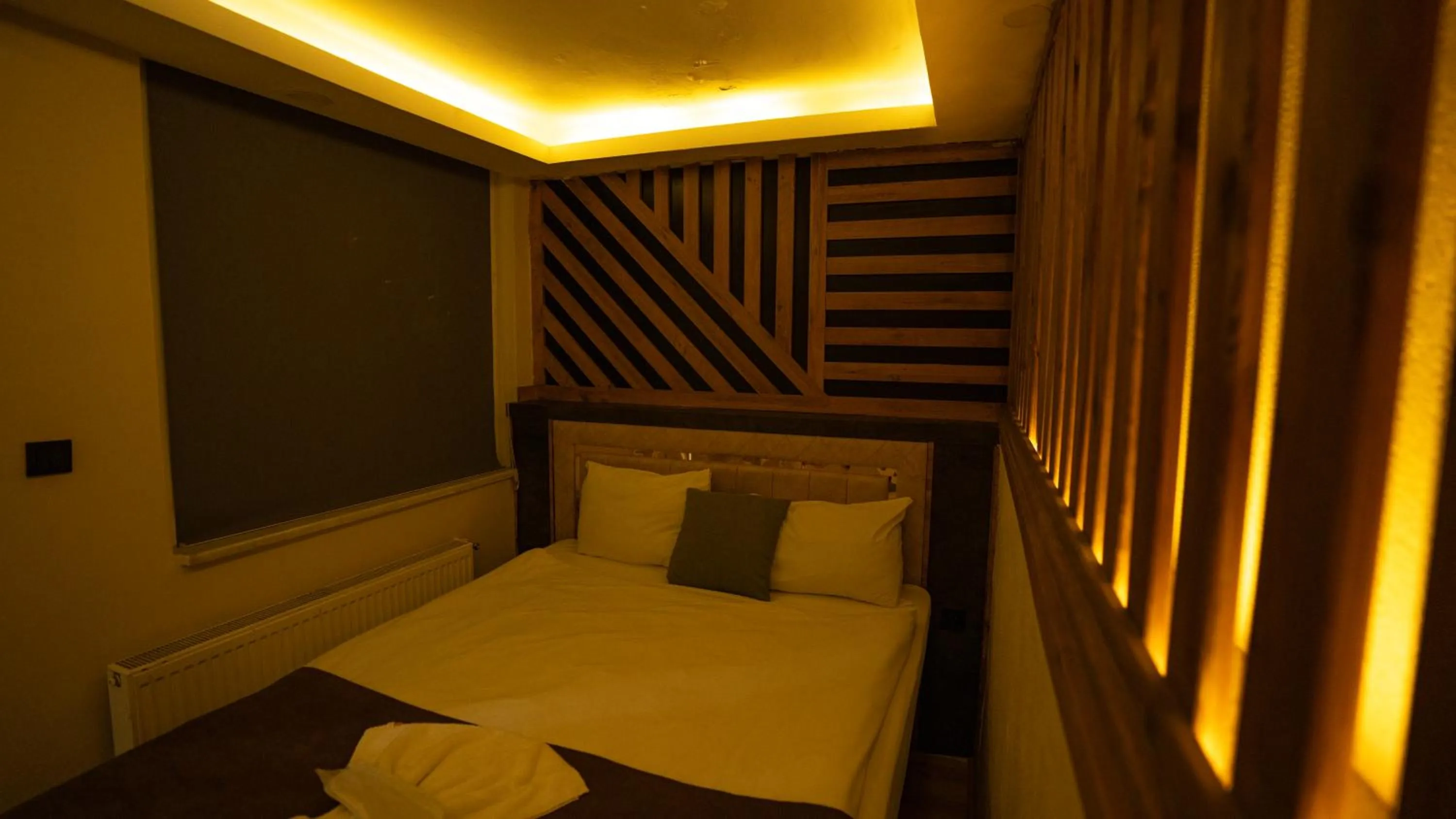 Bed in MİLA SUİTES TAKSİM