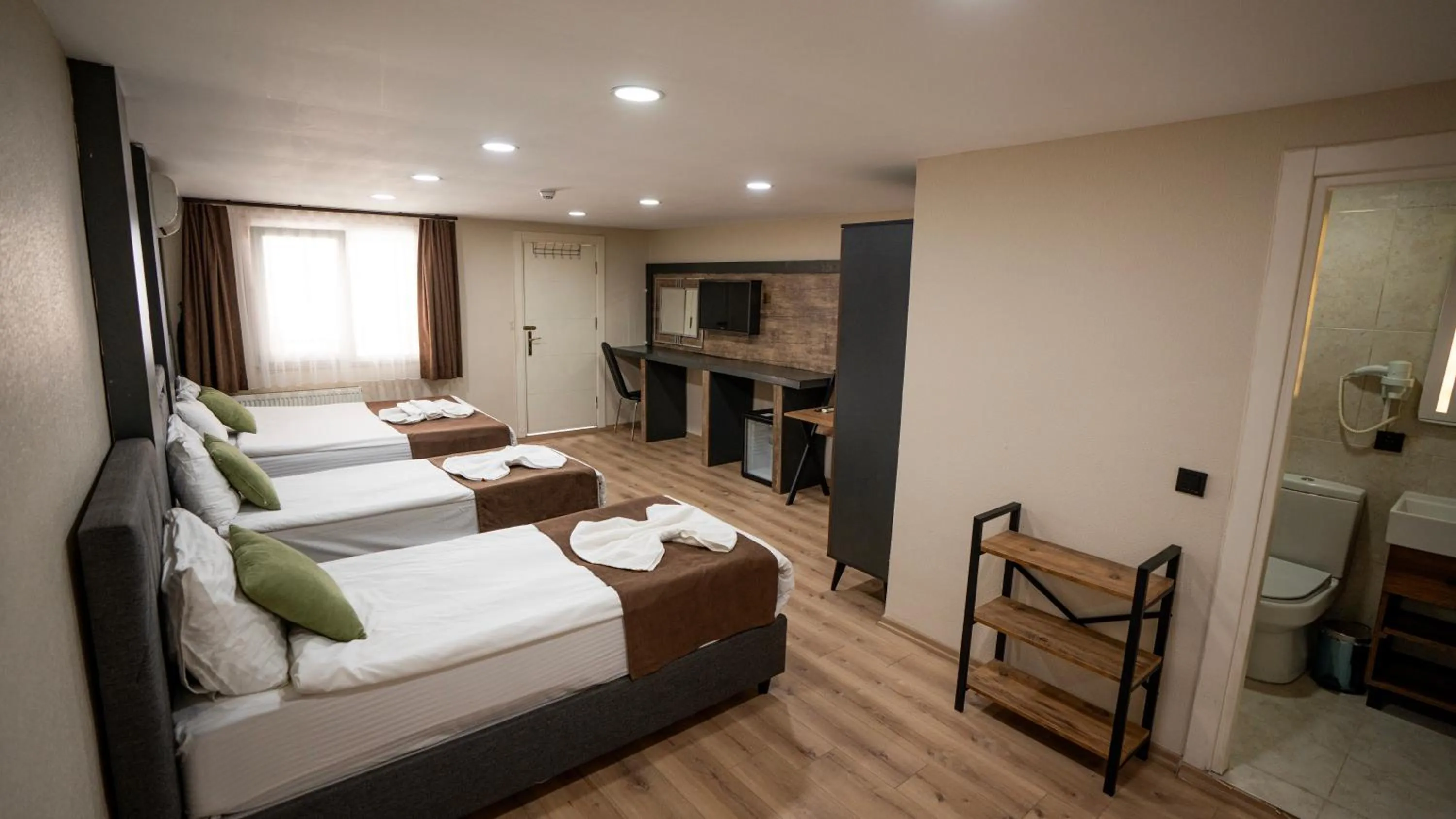 Bed in MİLA SUİTES TAKSİM