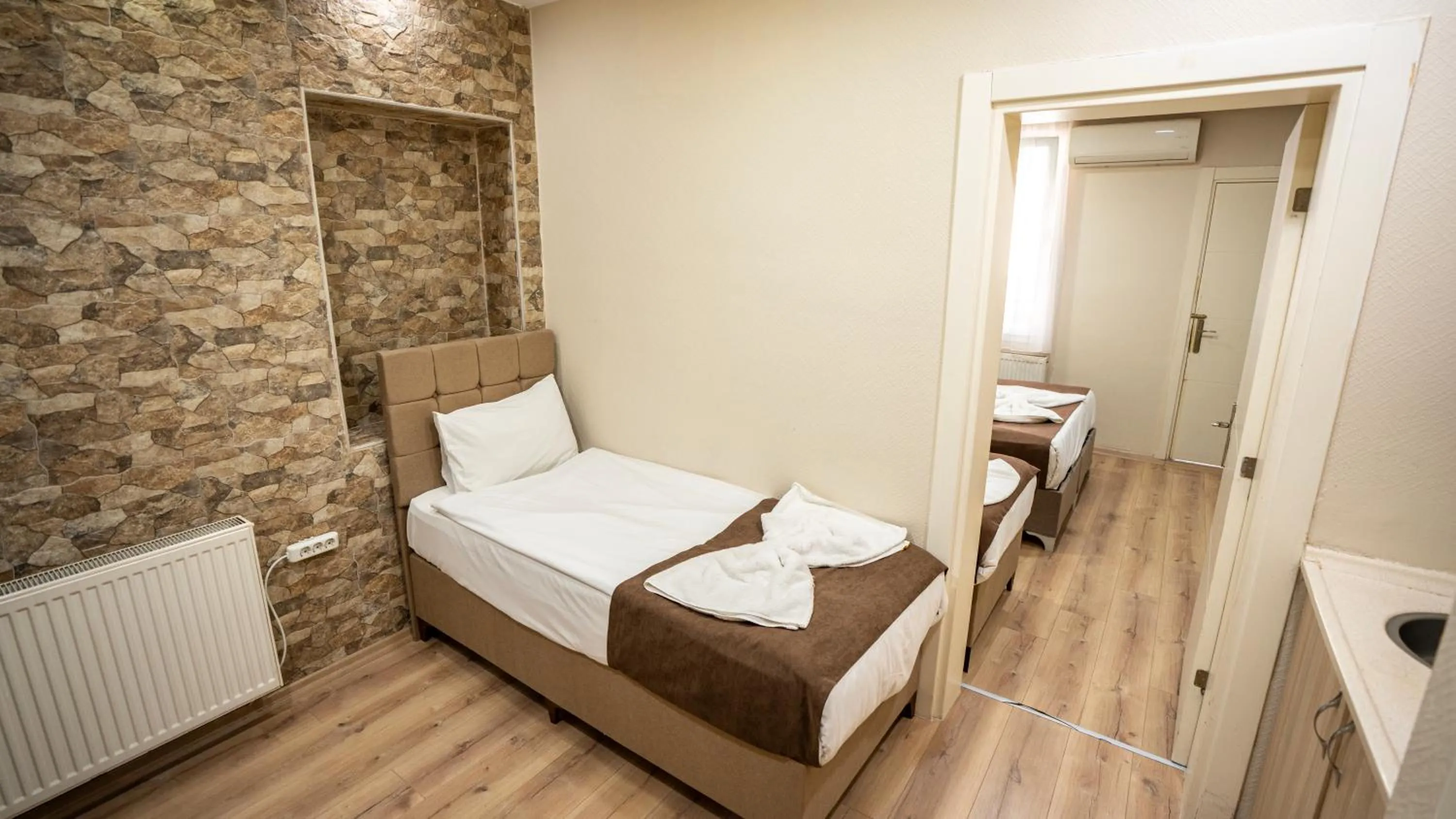 Bed in MİLA SUİTES TAKSİM