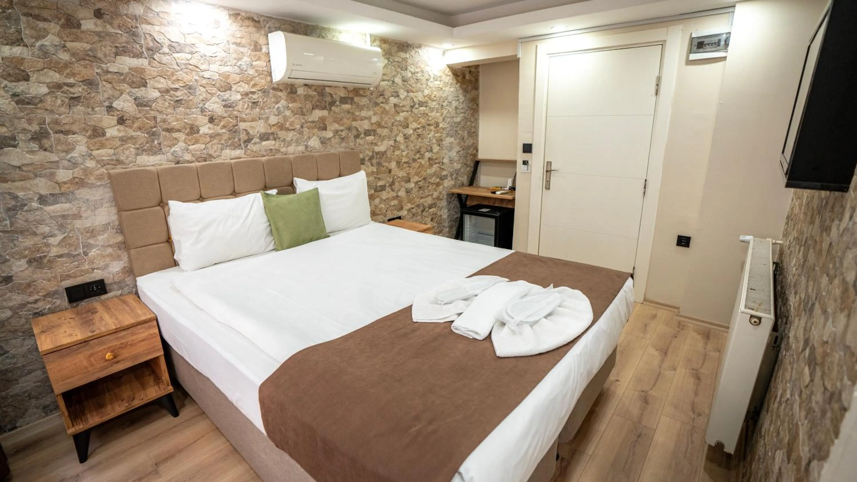 Bed in MİLA SUİTES TAKSİM