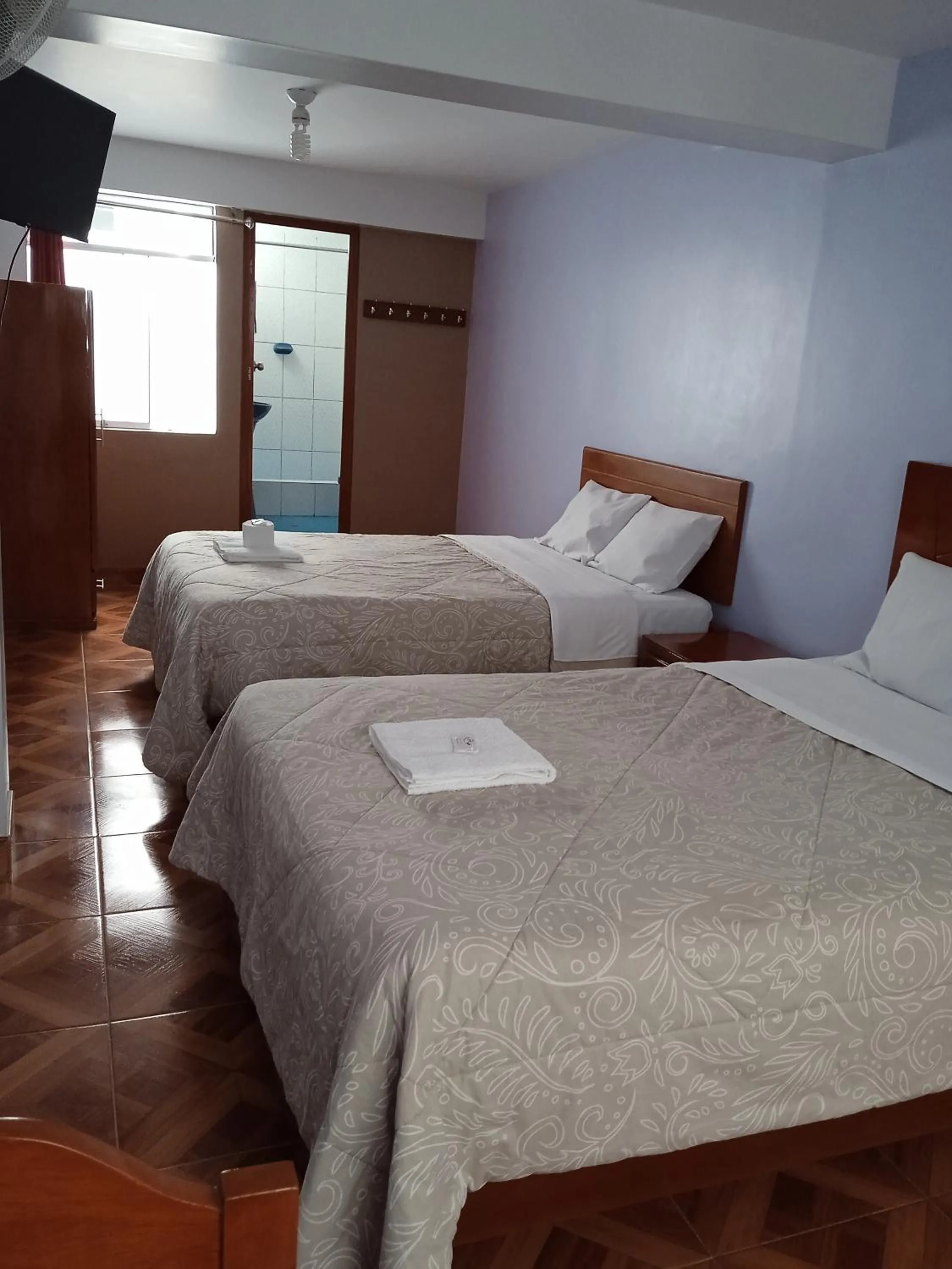 Bed in Hospedaje Feliz