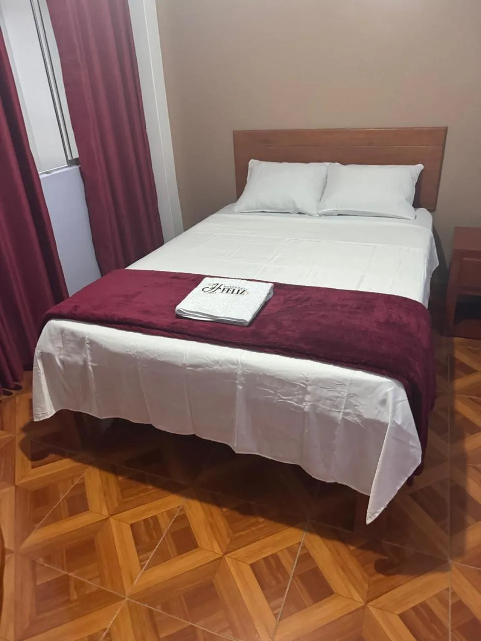 Bed in Hospedaje Feliz