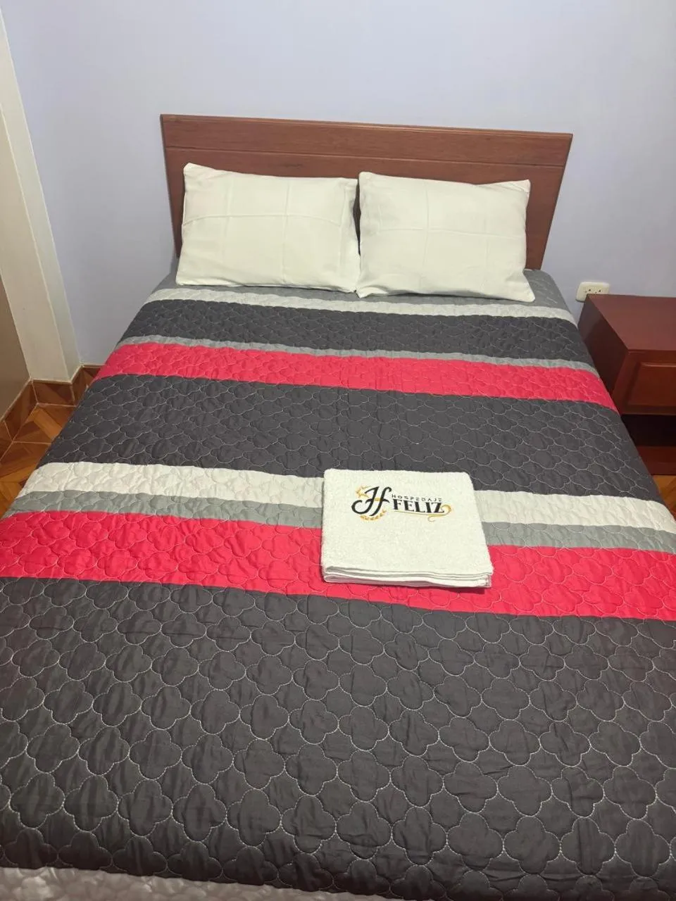 Bed in Hospedaje Feliz