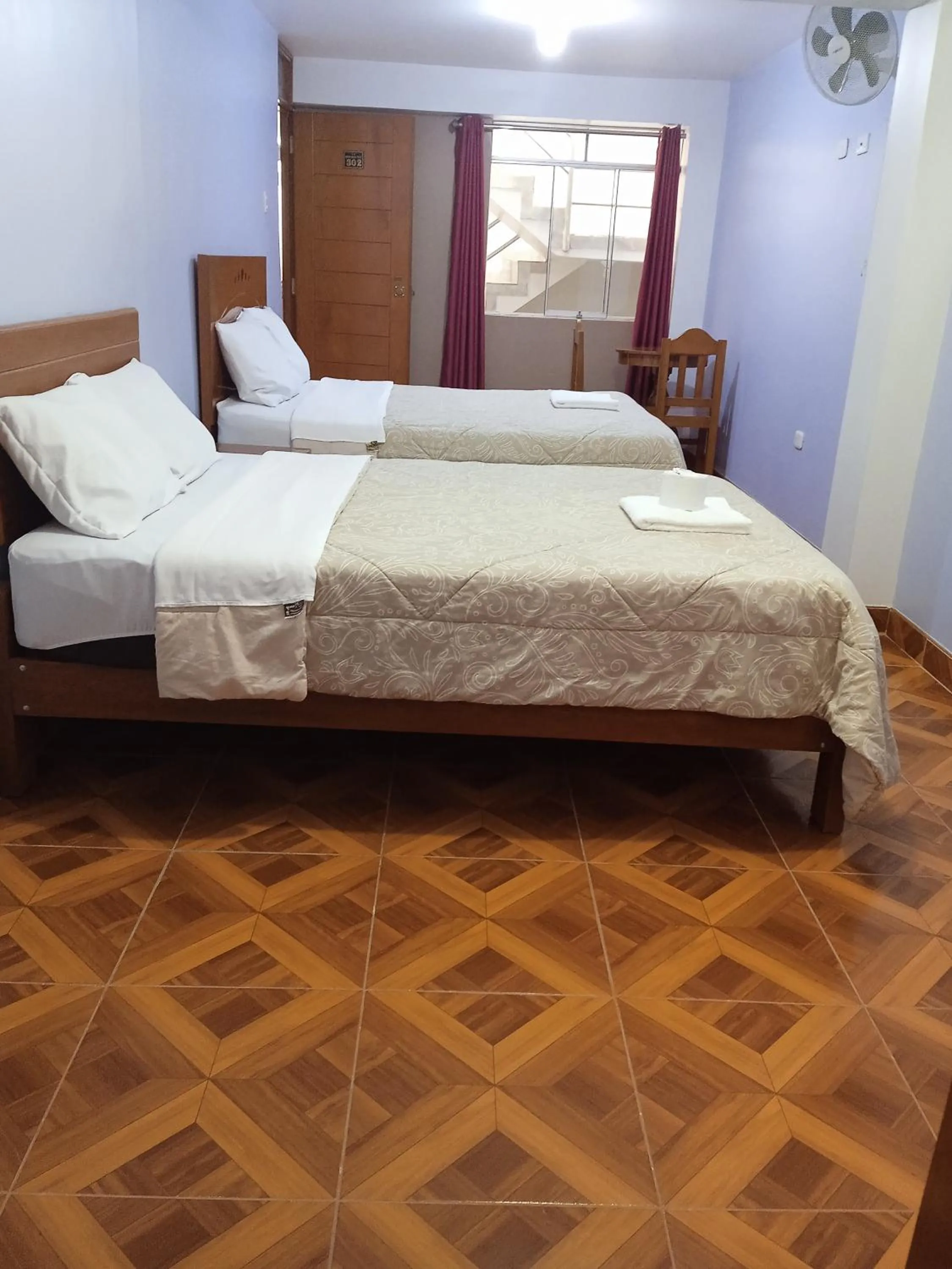 Bed in Hospedaje Feliz