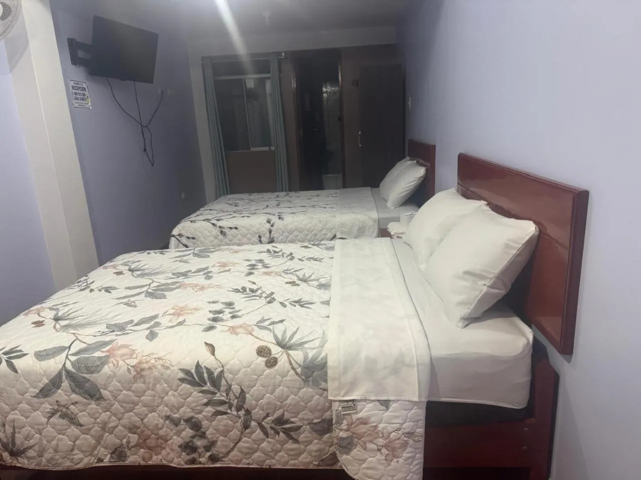 Bed in Hospedaje Feliz