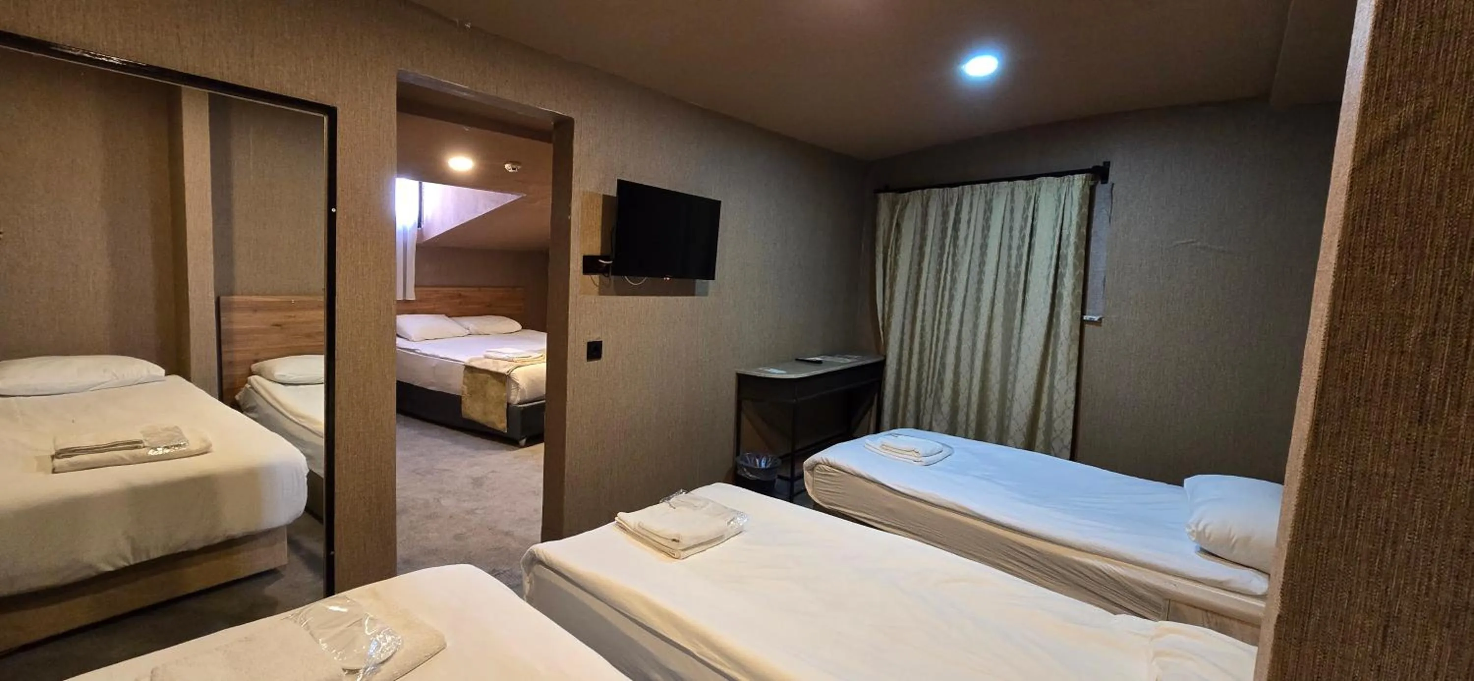 Communal lounge/ TV room, Bed in Lupo Libero Hotel Spa