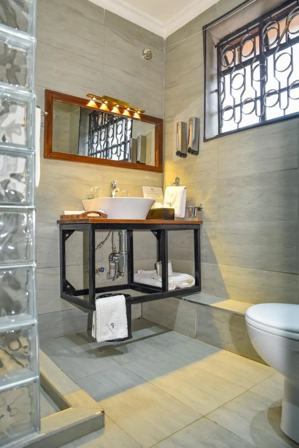 Toilet in Cozy Stead Hotel - Garden House, Gigiri