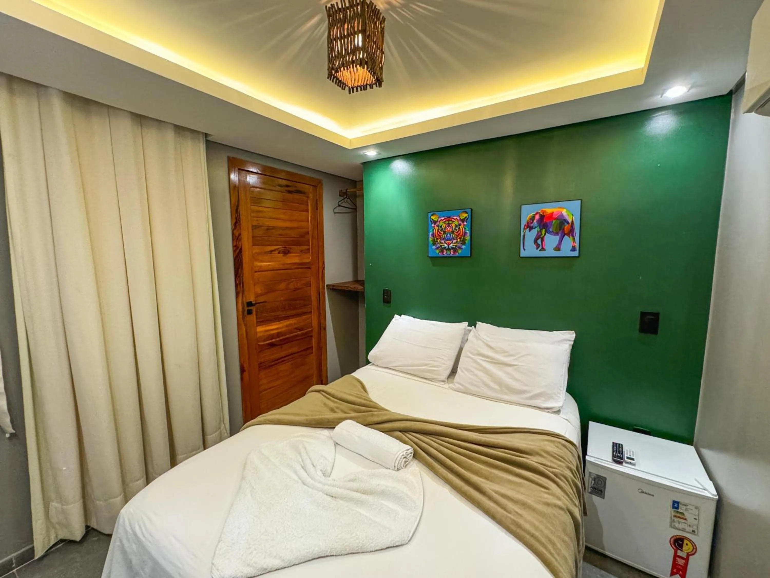 Bed in Milos Hotel Icaraizinho