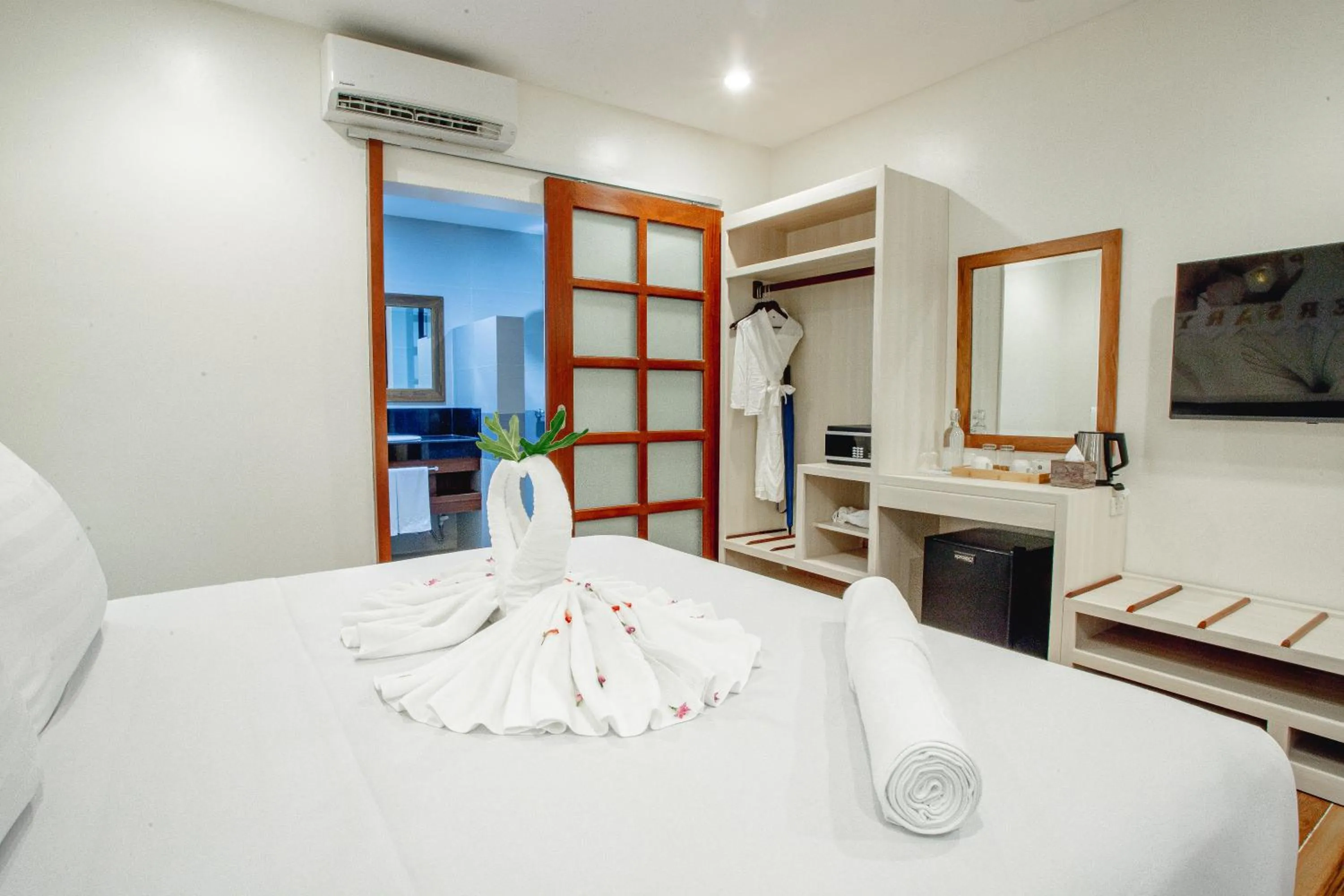 Bed in Ora Beach Resort