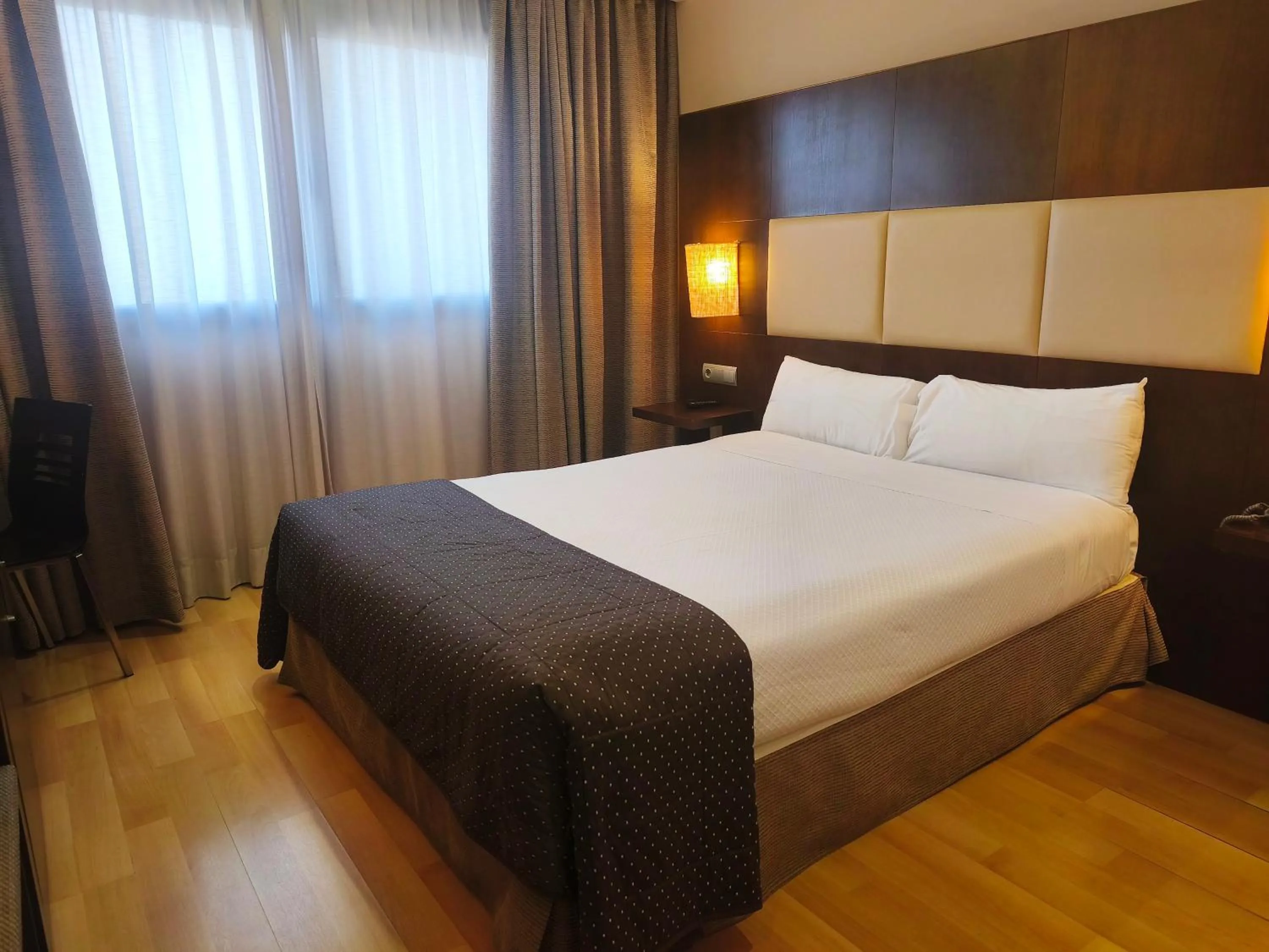 Bed in Hotel Sercotel Cuatro Postes