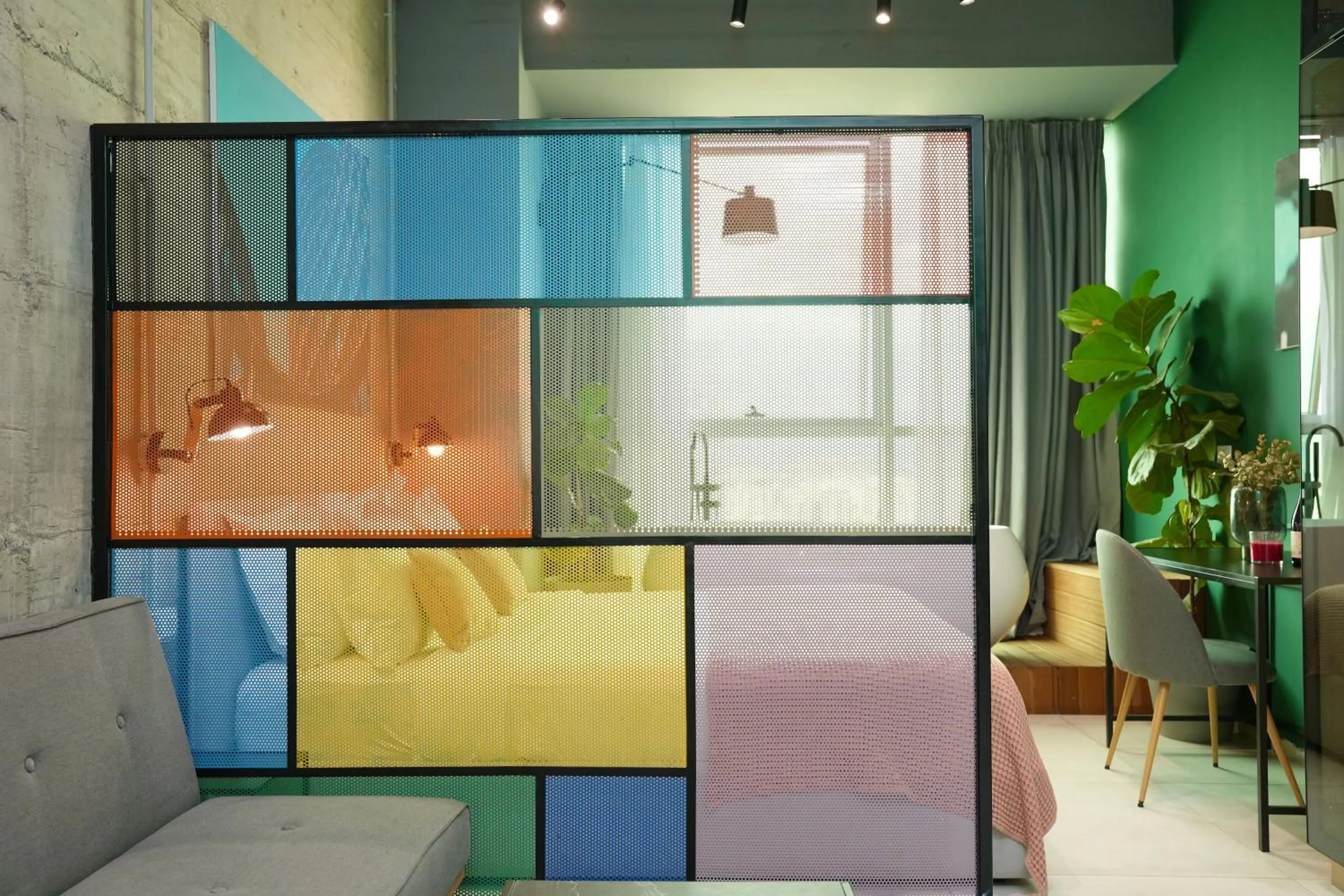 Bed in Ambassador Skyline Apartments