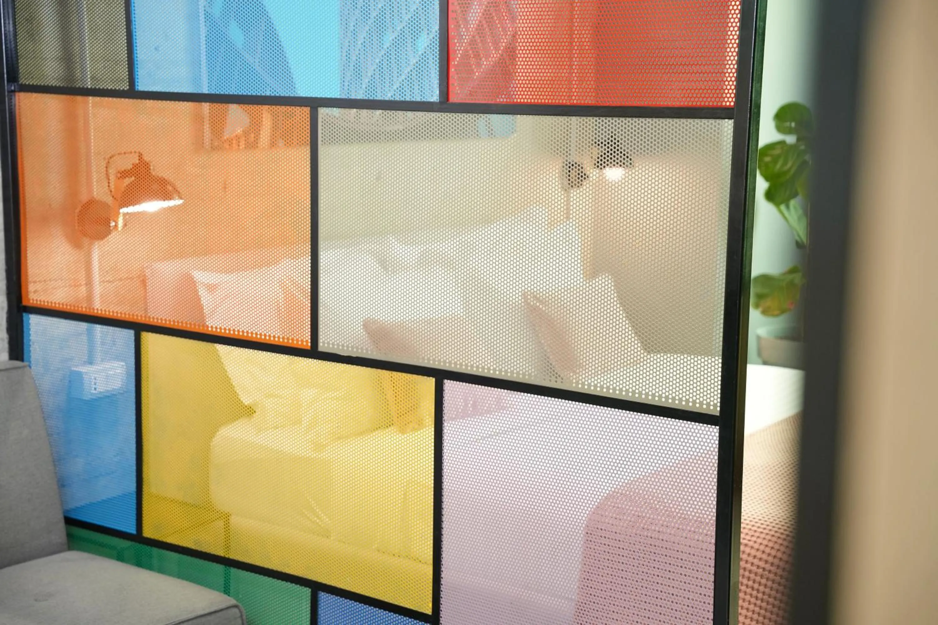 Bed in Ambassador Skyline Apartments